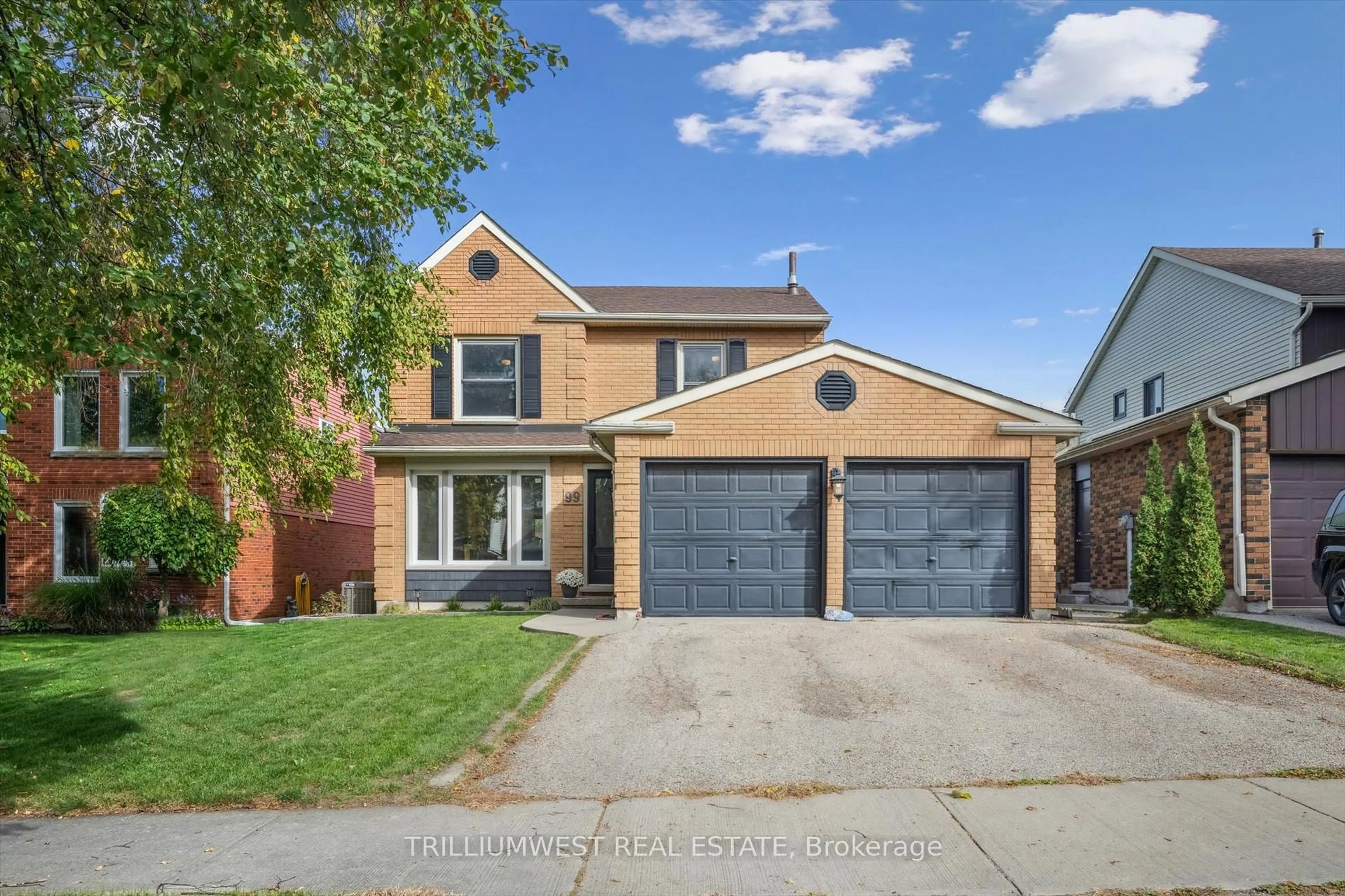 Home with brick exterior material, street for 99 Deerwood Cres, Kitchener Ontario N2N 1R4