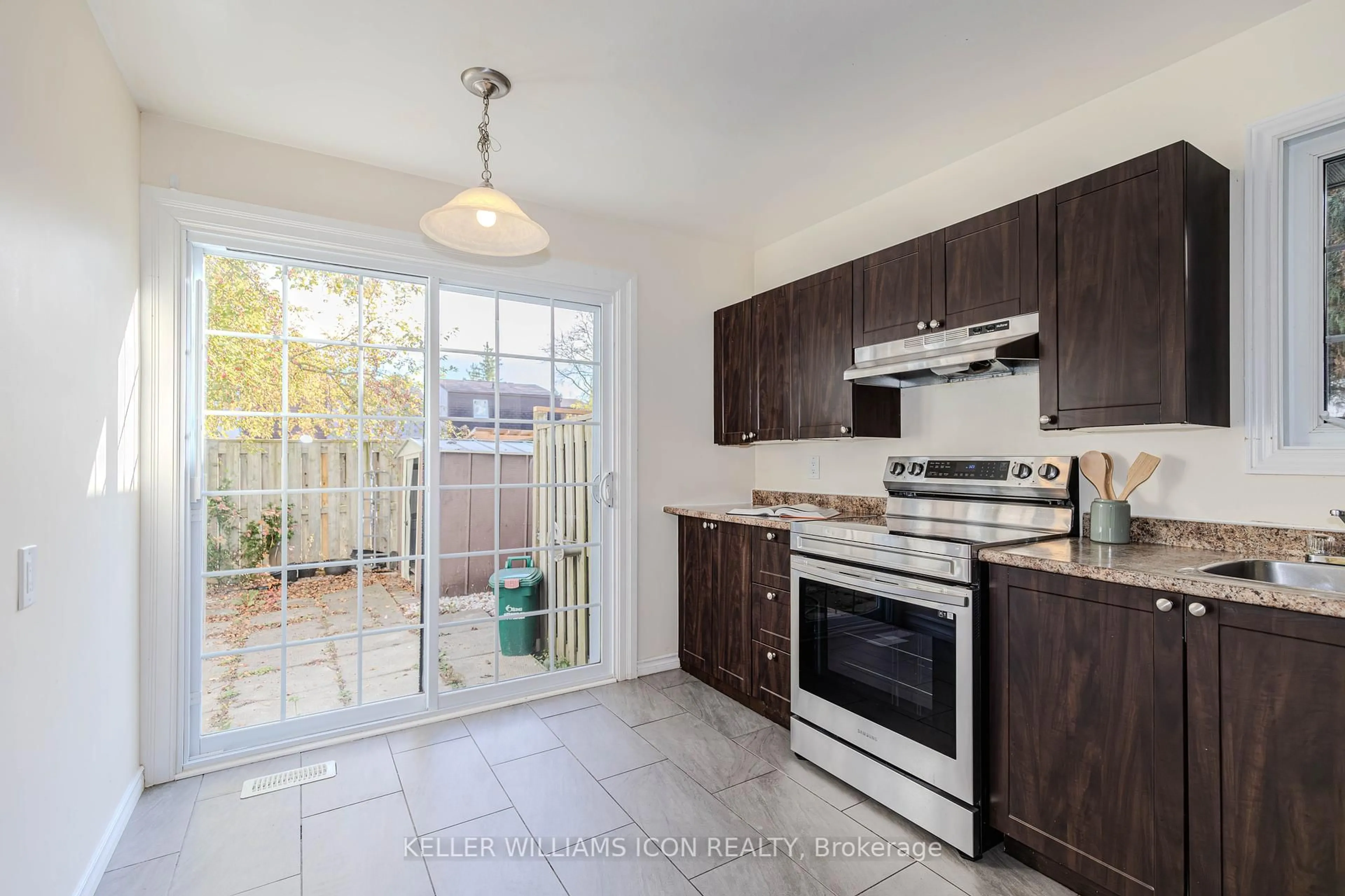 Open concept kitchen, ceramic/tile floor for 385 Kintyre Private, Ottawa Ontario K2C 3M6