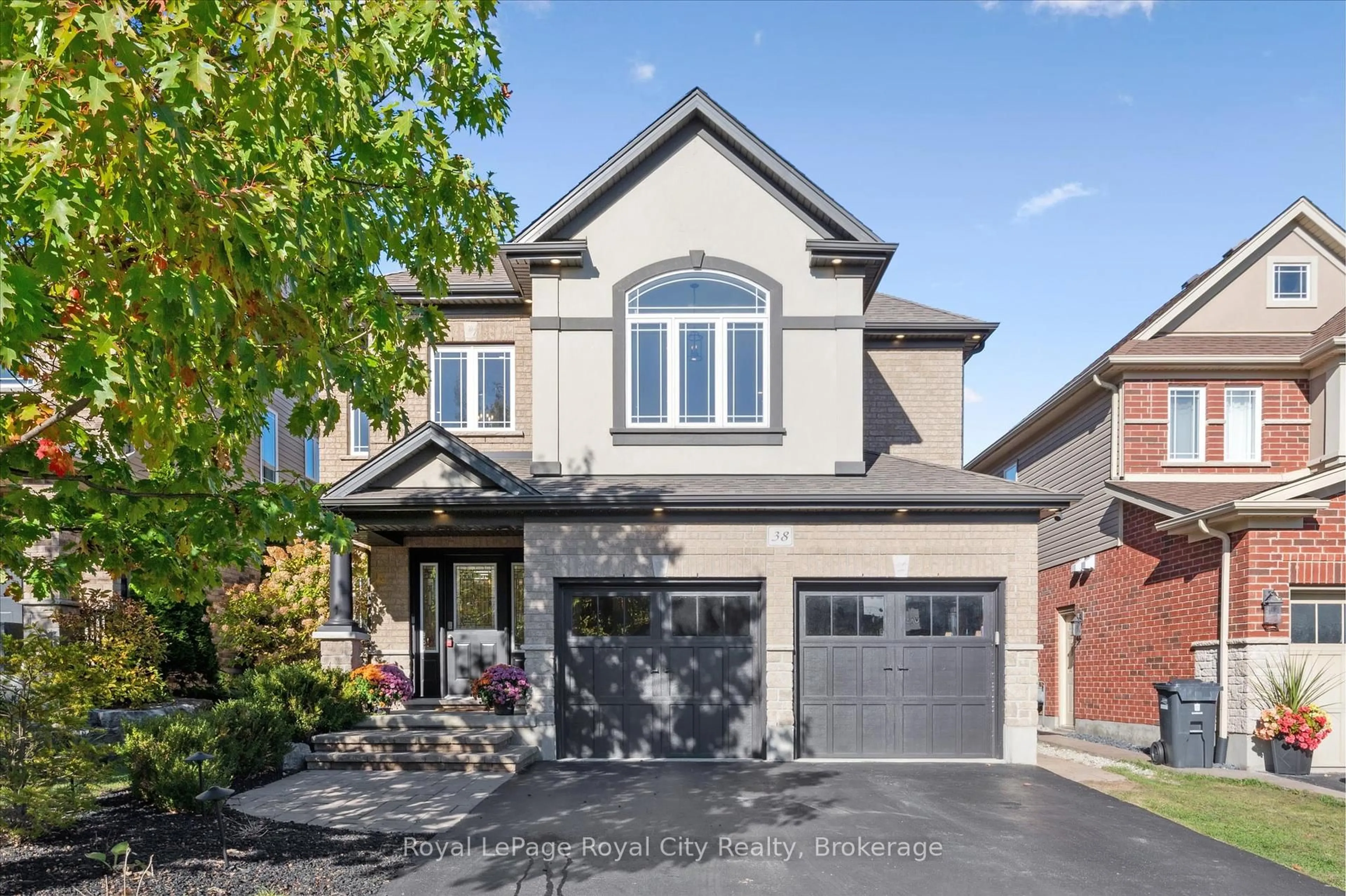 Home with brick exterior material, street for 38 Baxter Dr, Guelph Ontario N1L 0C8
