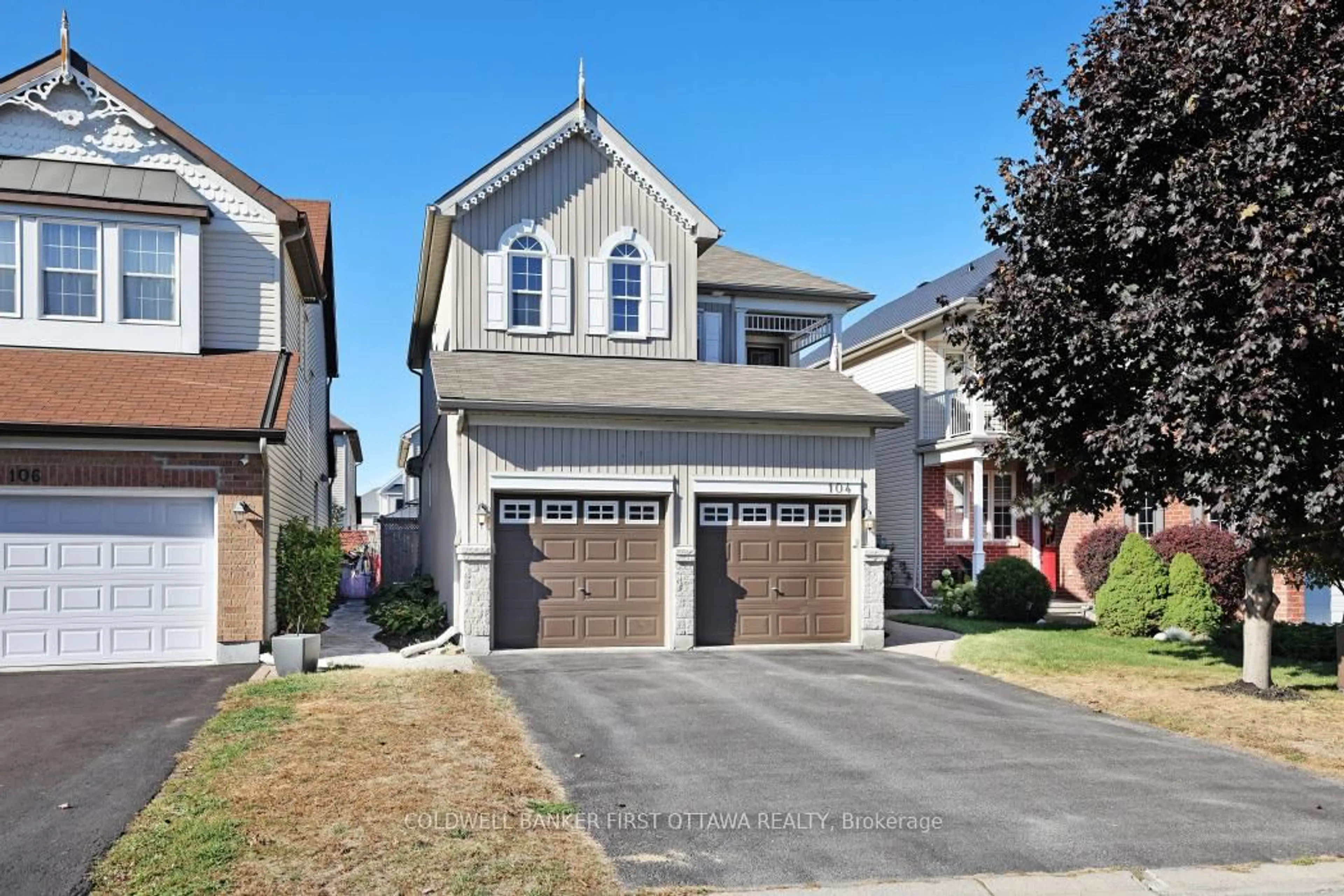 Home with brick exterior material, street for 104 Streamside Cres, Ottawa Ontario K2W 0A9