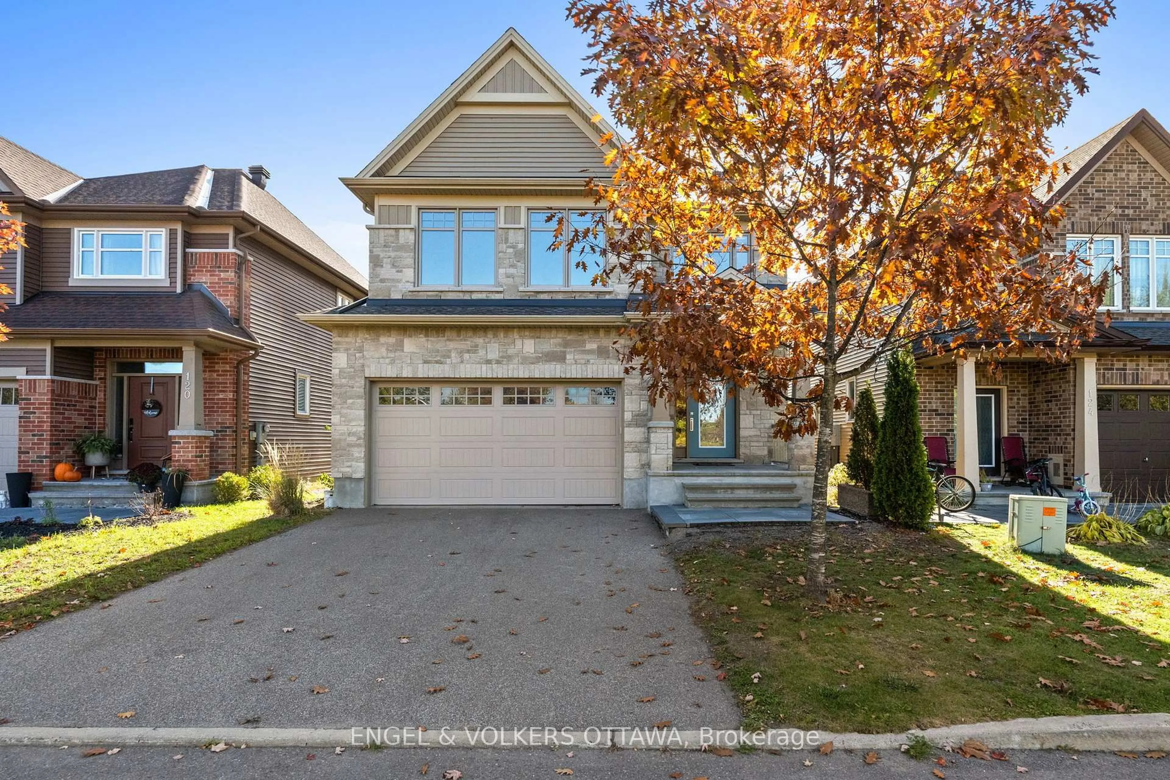 Home with brick exterior material, street for 122 Helen Rapp Way, Ottawa Ontario K1T 0N4