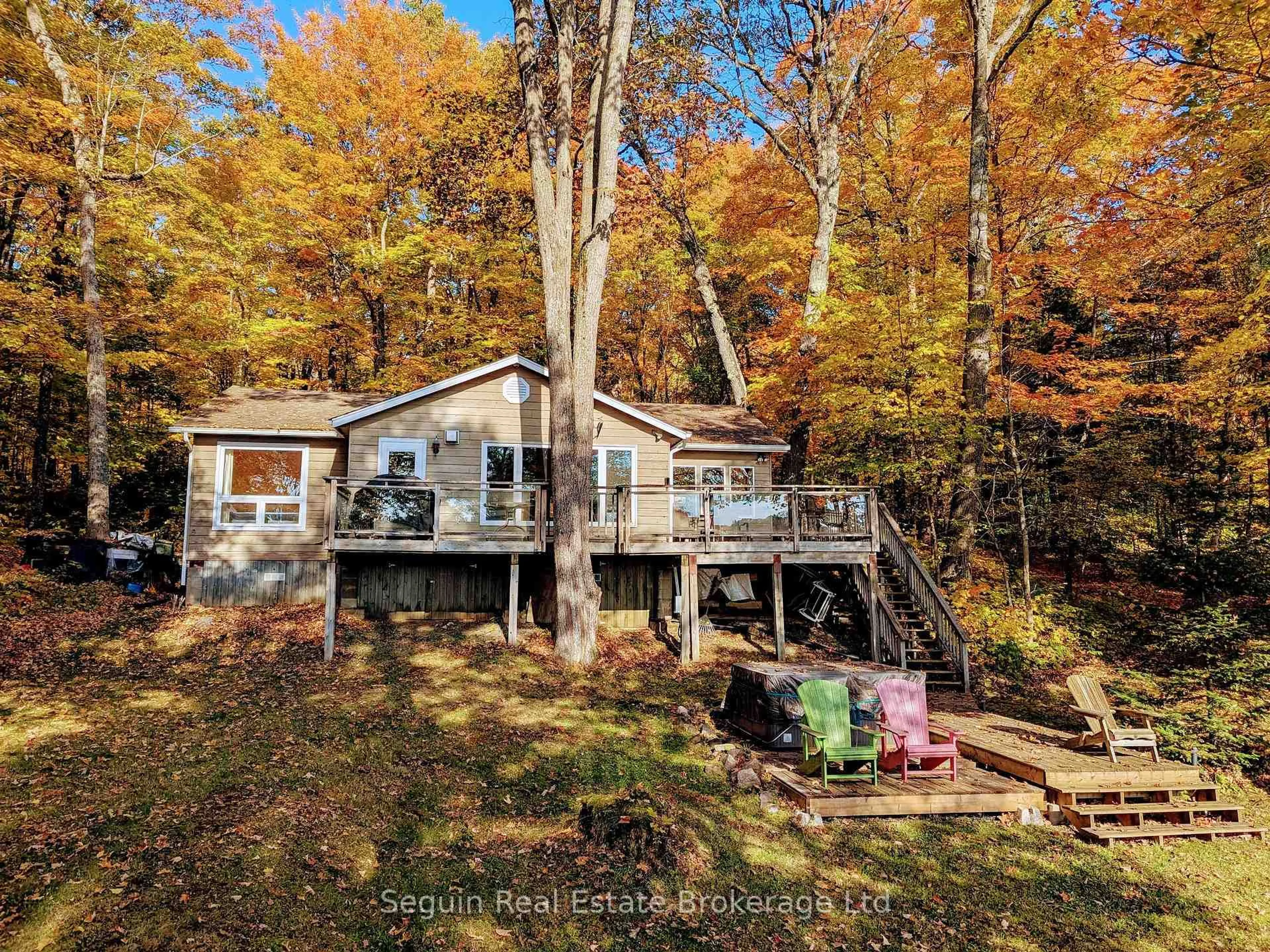A pic from outside/outdoor area/front of a property/back of a property/a pic from drone, forest/trees view for 151 Sugar Lake Rd, Seguin Ontario P2A 0B6