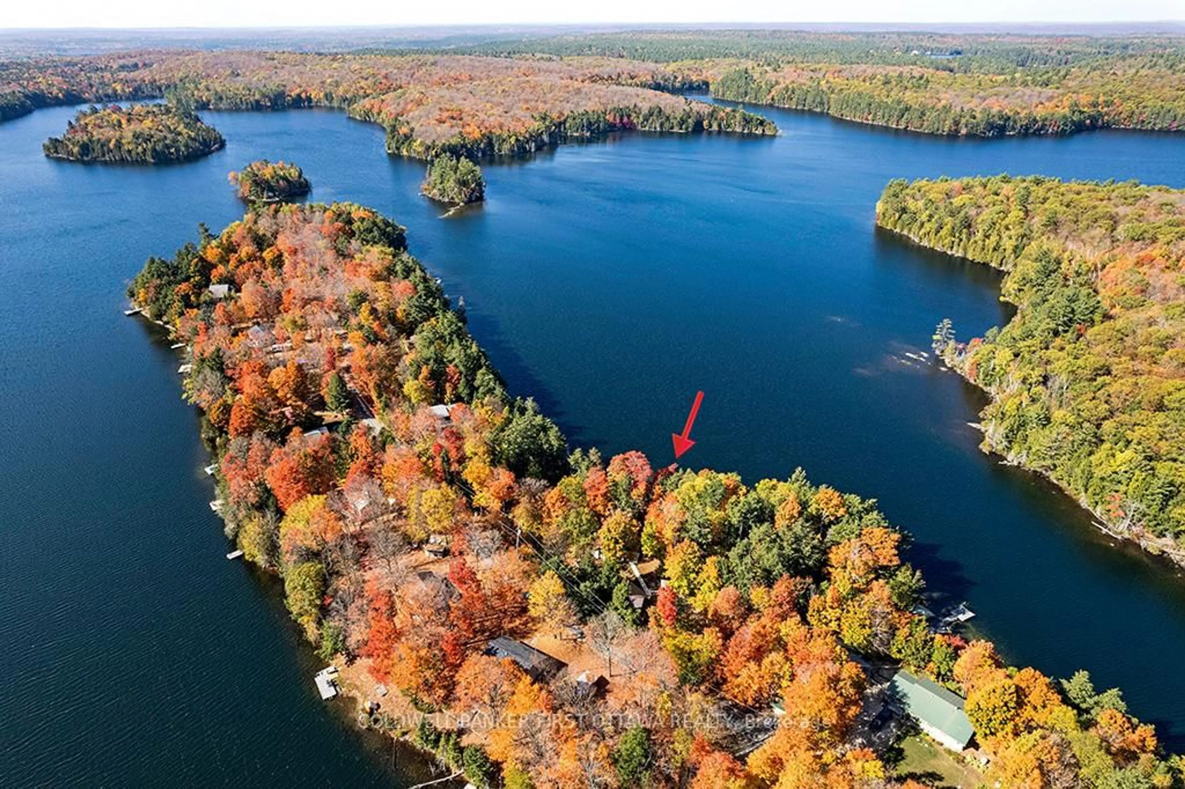 A pic from outside/outdoor area/front of a property/back of a property/a pic from drone, water/lake/river/ocean view for 2234A Grindstone Lake Rd, Plevna Ontario K0H 2M0