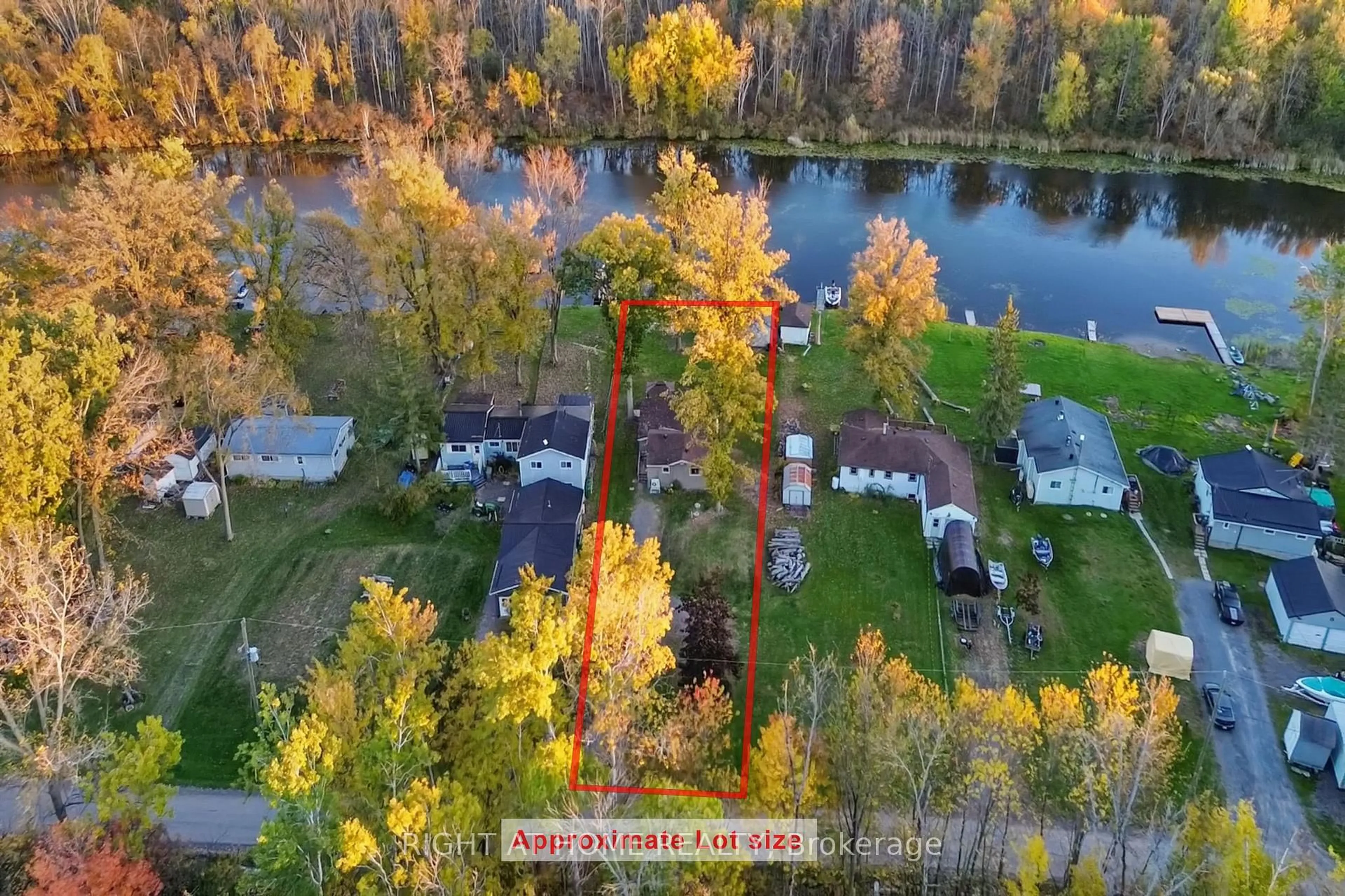 A pic from outside/outdoor area/front of a property/back of a property/a pic from drone, water/lake/river/ocean view for 49 River Rd, Trent Hills Ontario K0L 1L0