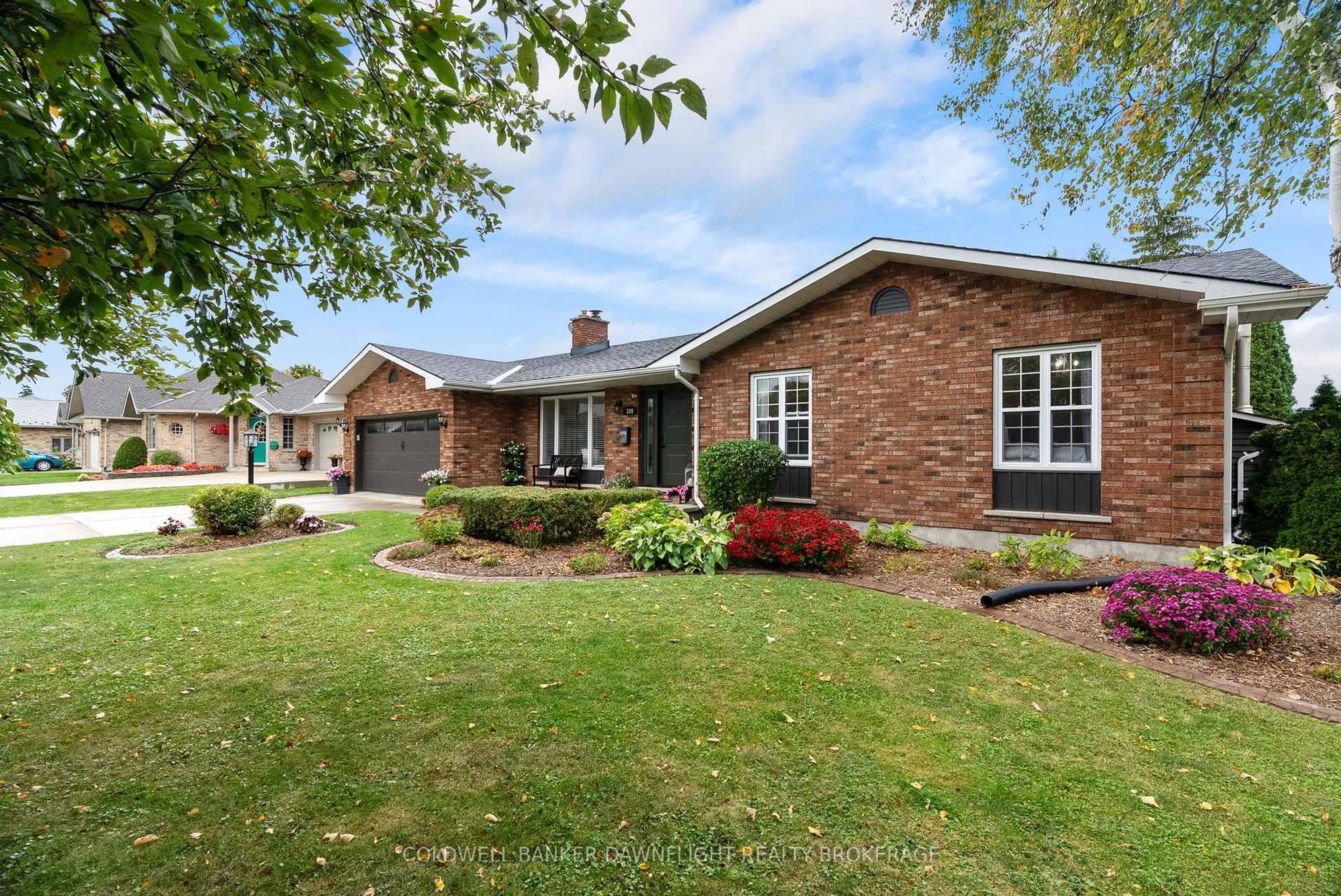 Home with brick exterior material, street for 399 Pryde Blvd, South Huron Ontario N0M 1S1