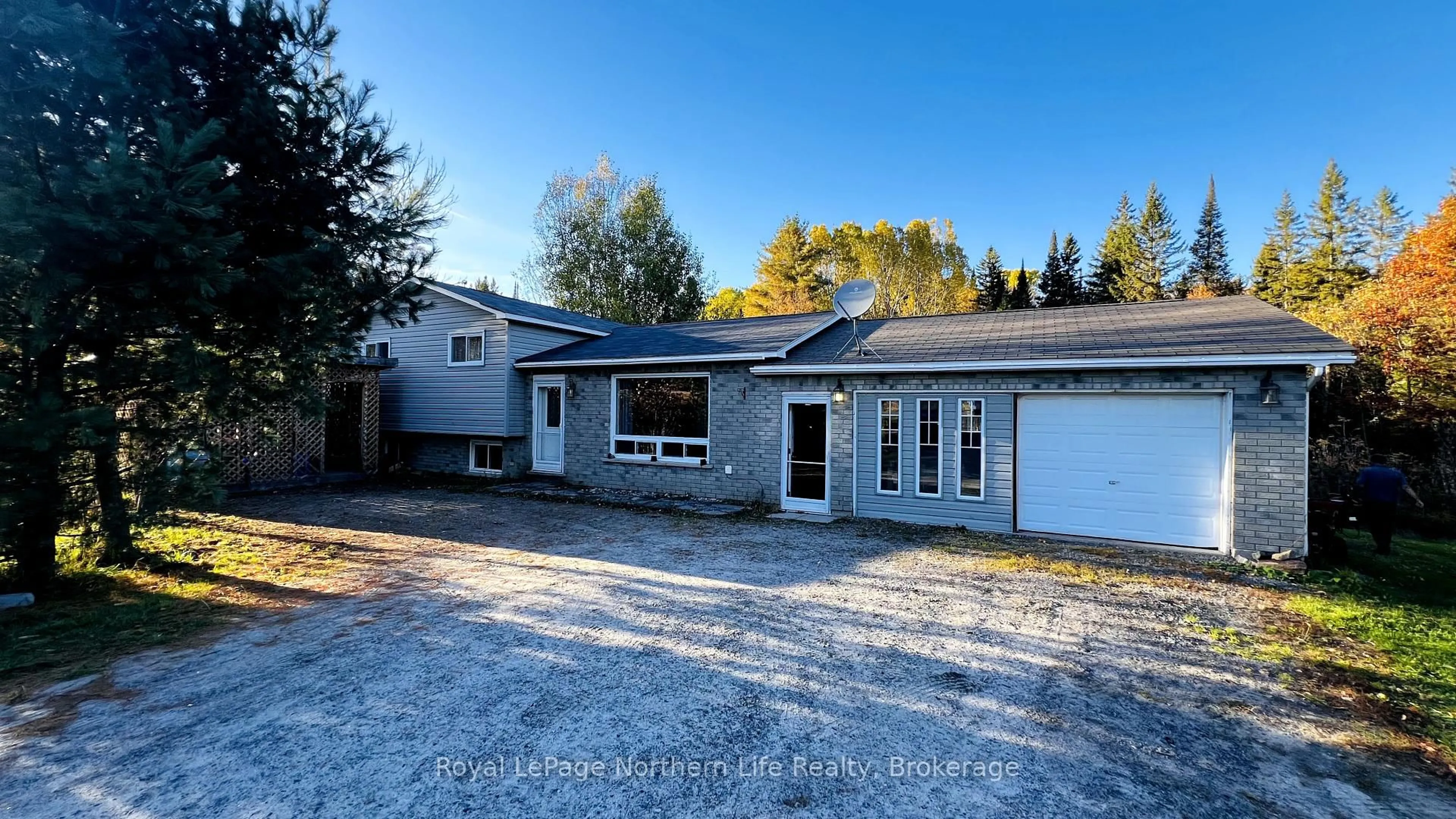 A pic from outside/outdoor area/front of a property/back of a property/a pic from drone, street for 36 Highway 520, Armour Ontario P0A 1C0