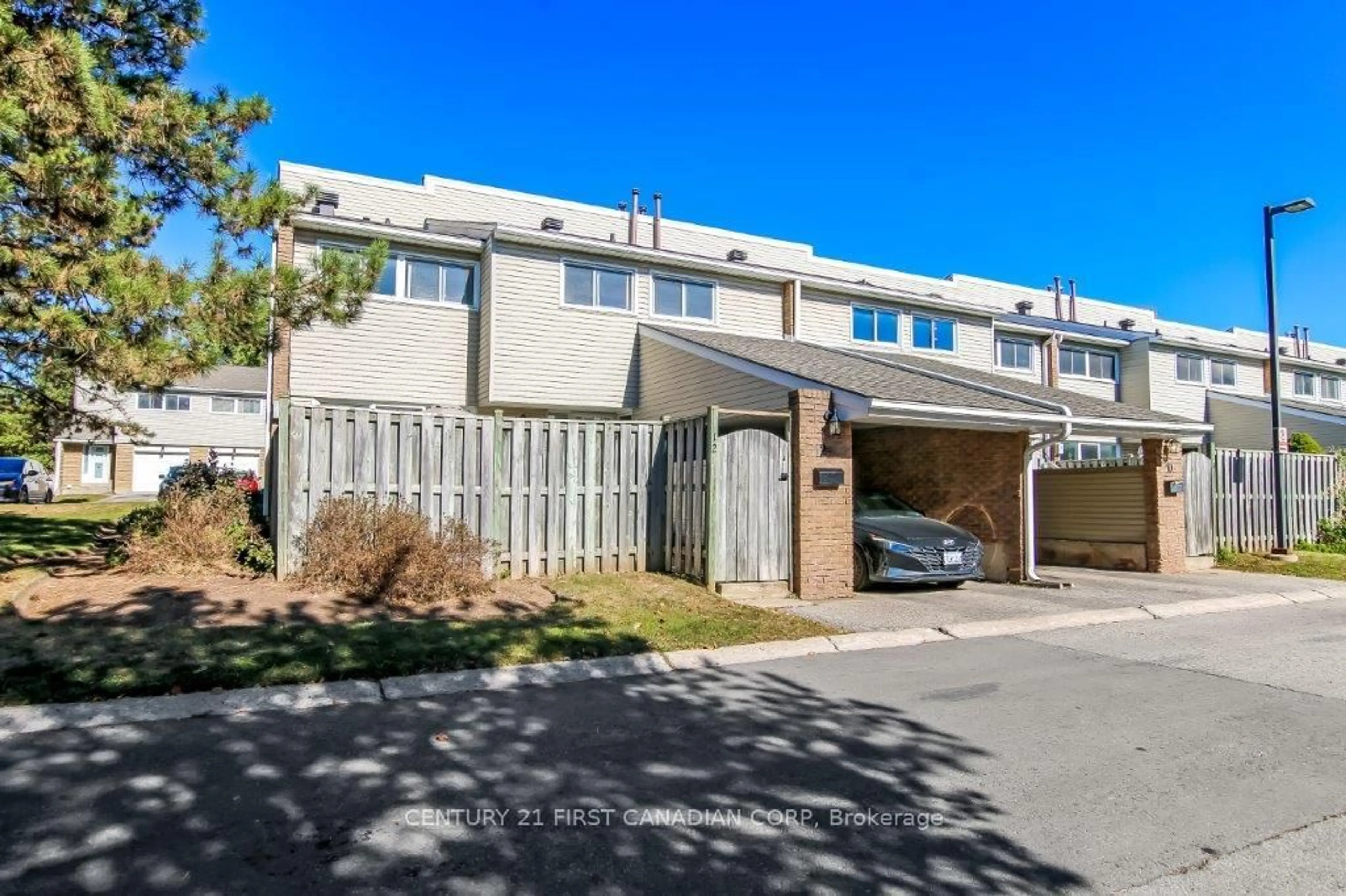 A pic from outside/outdoor area/front of a property/back of a property/a pic from drone, street for 590 Millbank Dr #12, London South Ontario N6E 2H2