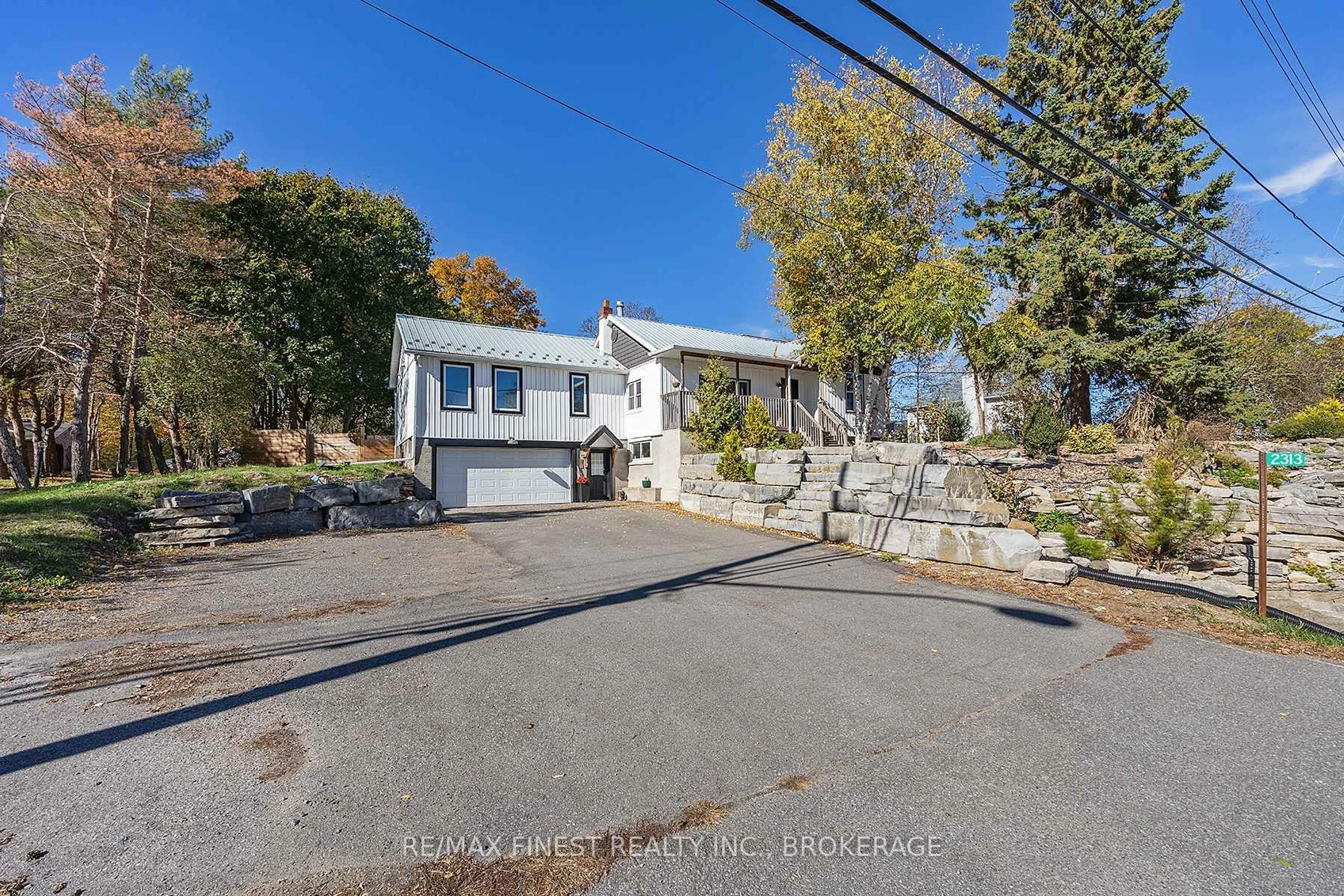 A pic from outside/outdoor area/front of a property/back of a property/a pic from drone, street for 2313 Sydenham Rd, Mcdonalds Corners Ontario K0H 1M0
