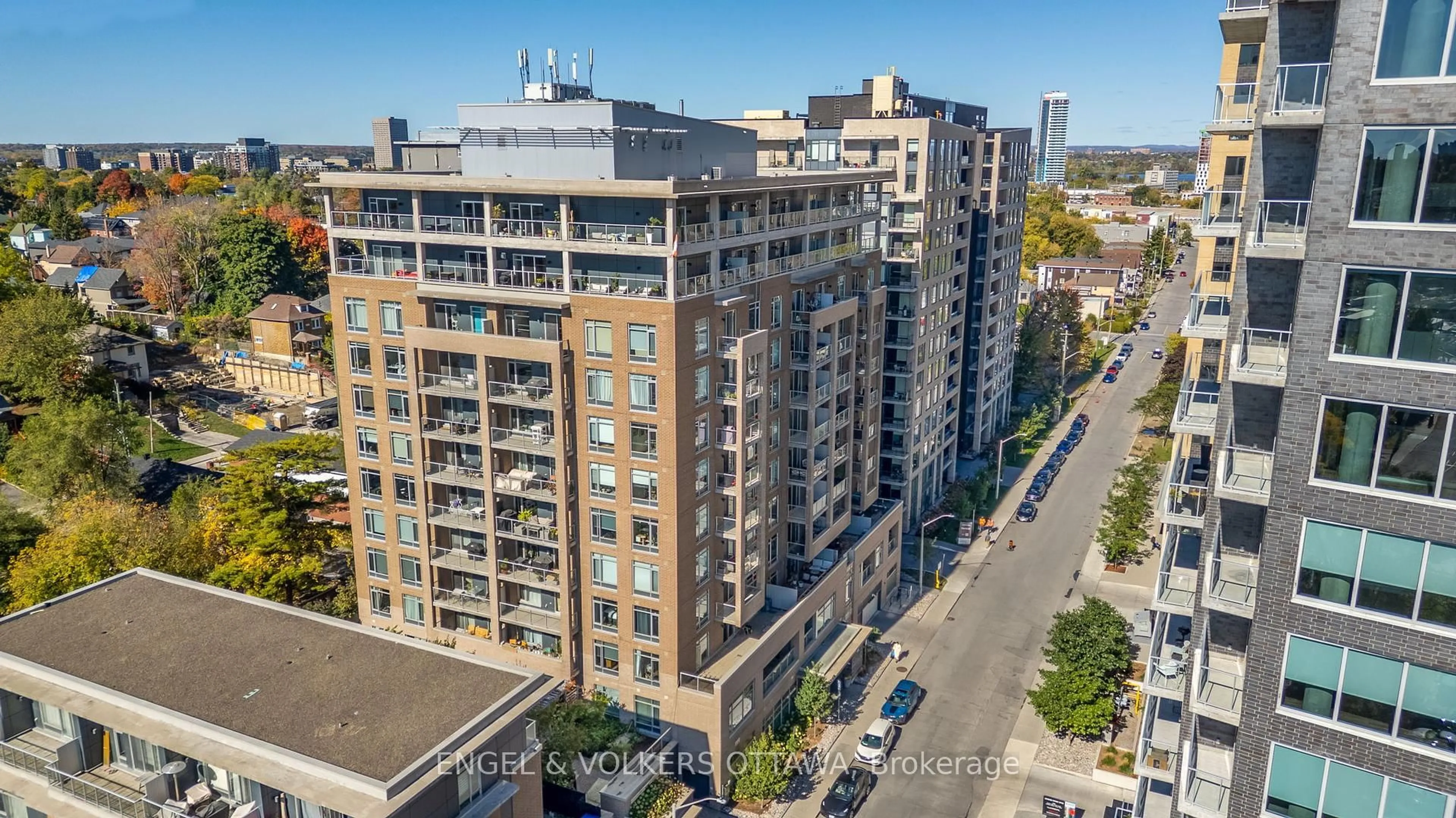 A pic from outside/outdoor area/front of a property/back of a property/a pic from drone, city buildings view from balcony for 100 Champagne Ave #207, Ottawa Ontario K1S 4P4