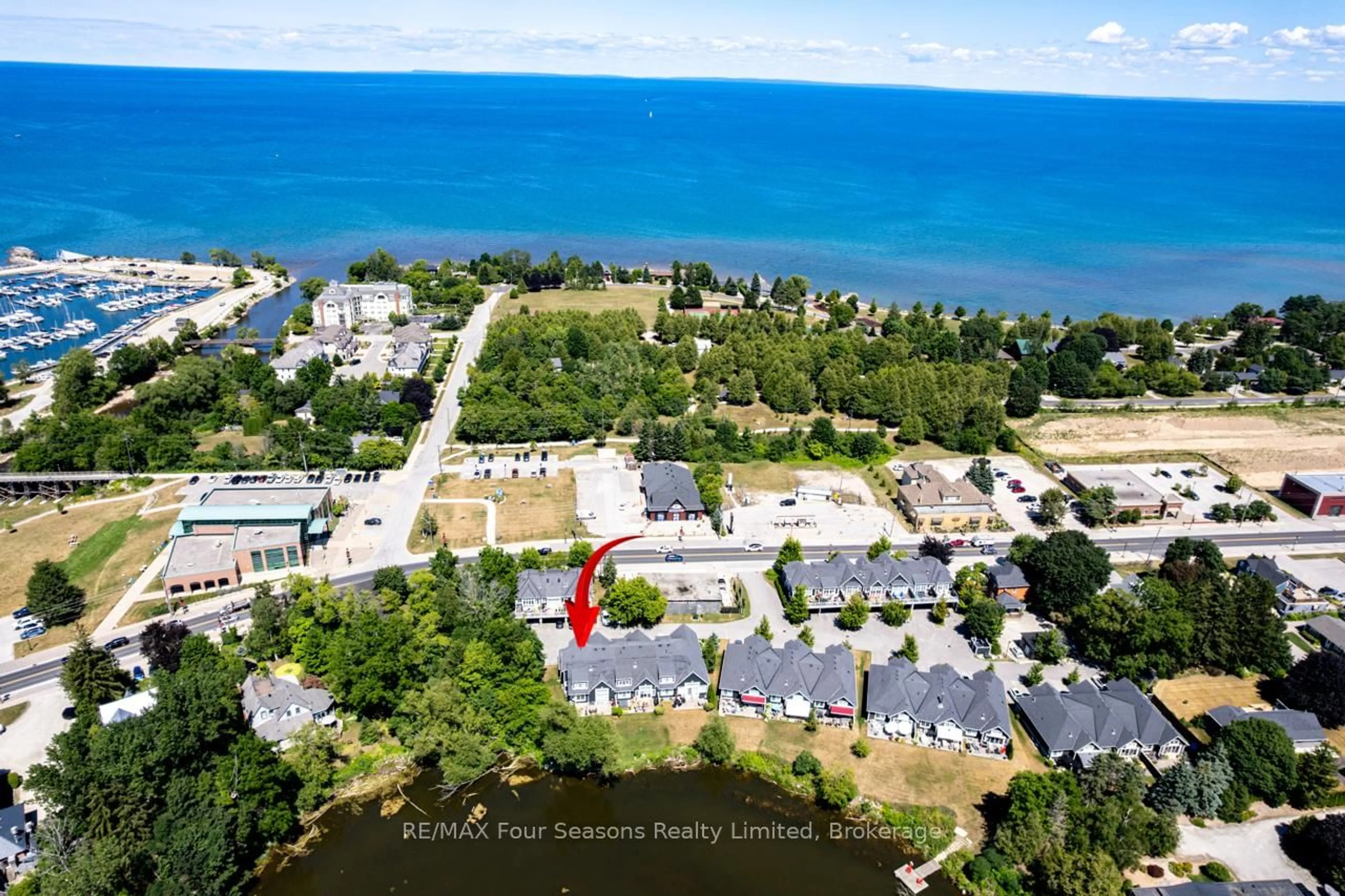 A pic from outside/outdoor area/front of a property/back of a property/a pic from drone, water/lake/river/ocean view for 59 King St #22, Blue Mountains Ontario N0H 2P0
