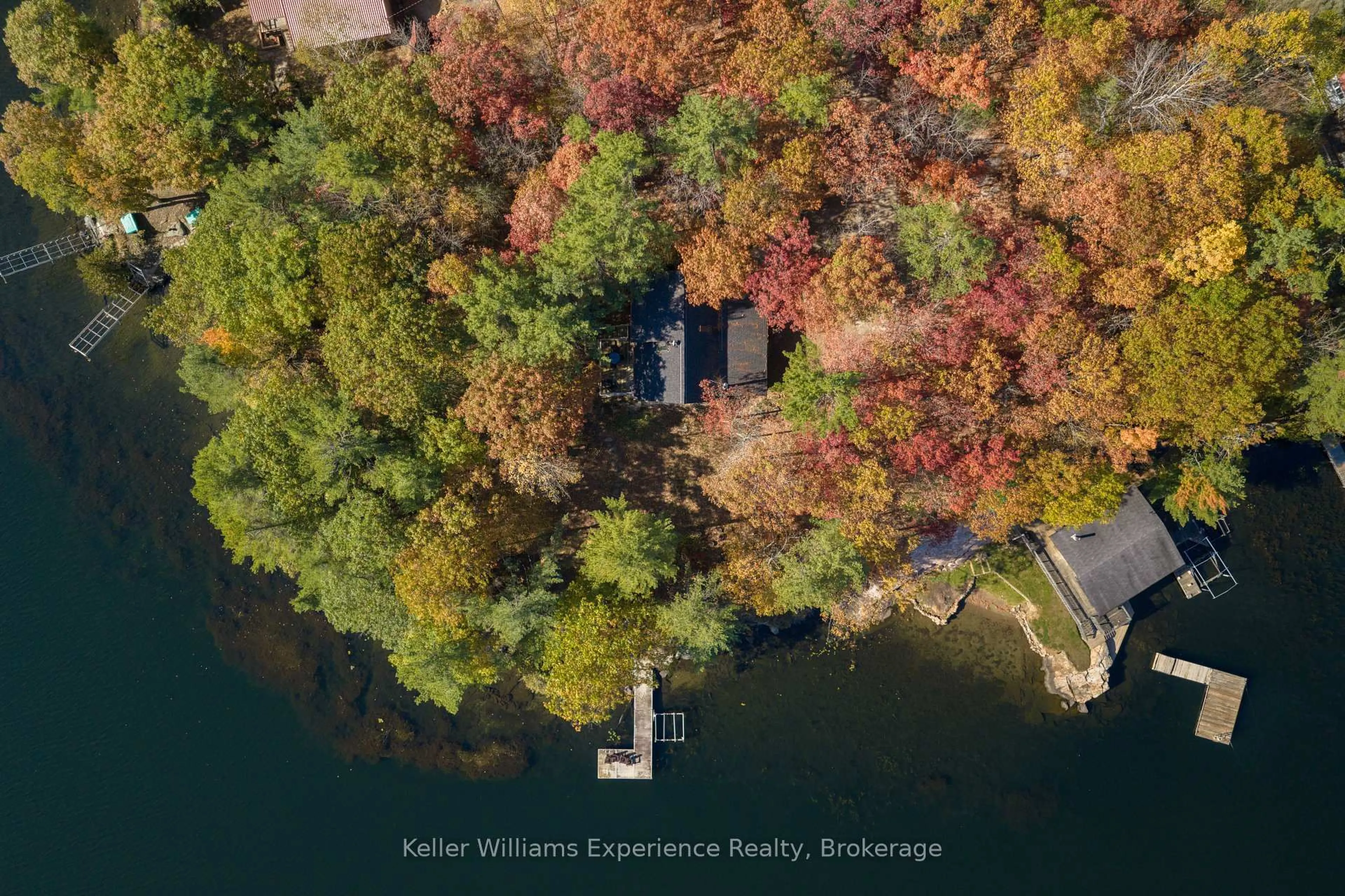 A pic from outside/outdoor area/front of a property/back of a property/a pic from drone, water/lake/river/ocean view for 1317 West Lionshead Rd, Gravenhurst Ontario N0H 1W0