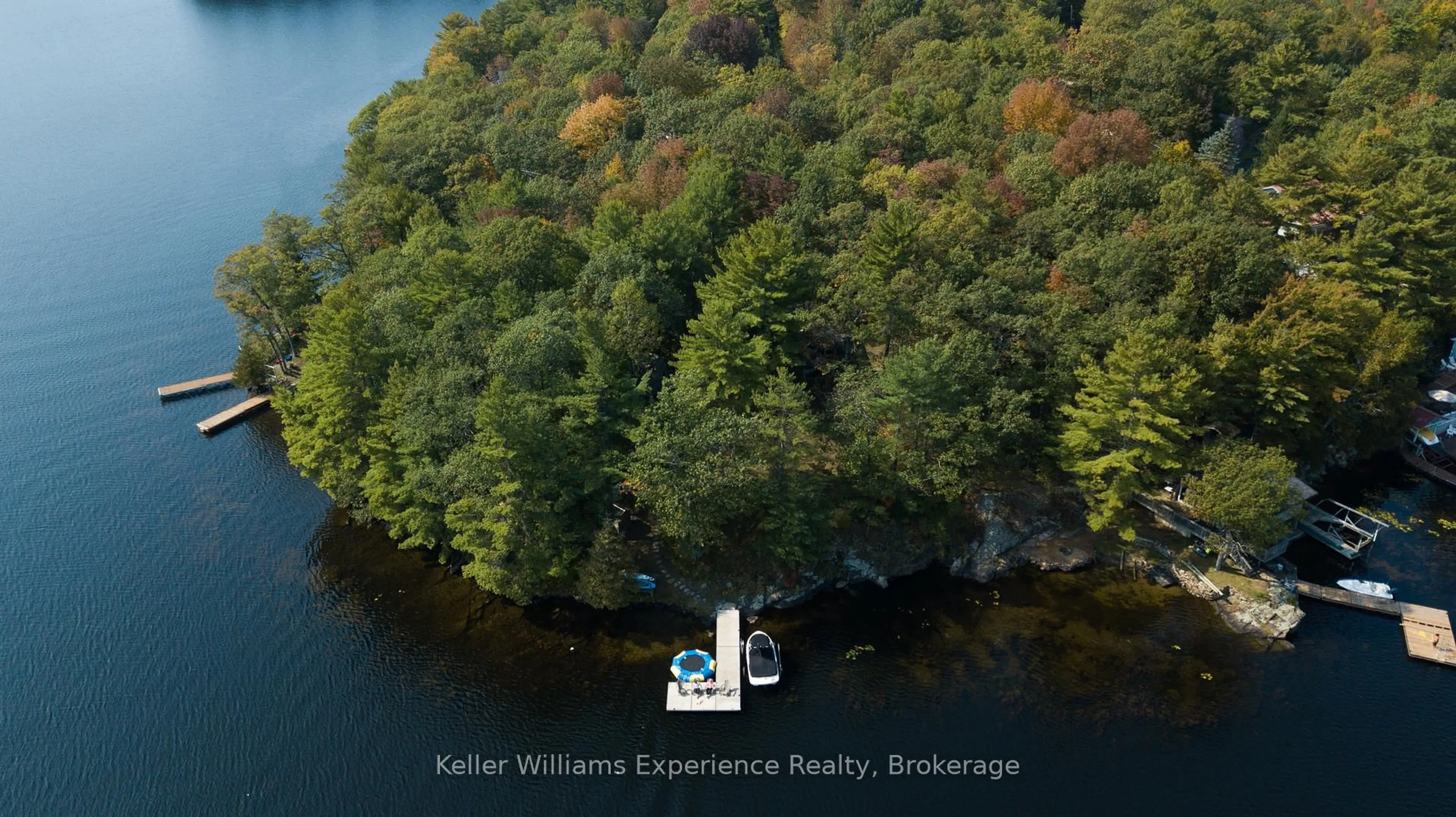 A pic from outside/outdoor area/front of a property/back of a property/a pic from drone, water/lake/river/ocean view for 1317 West Lionshead Rd, Gravenhurst Ontario N0H 1W0