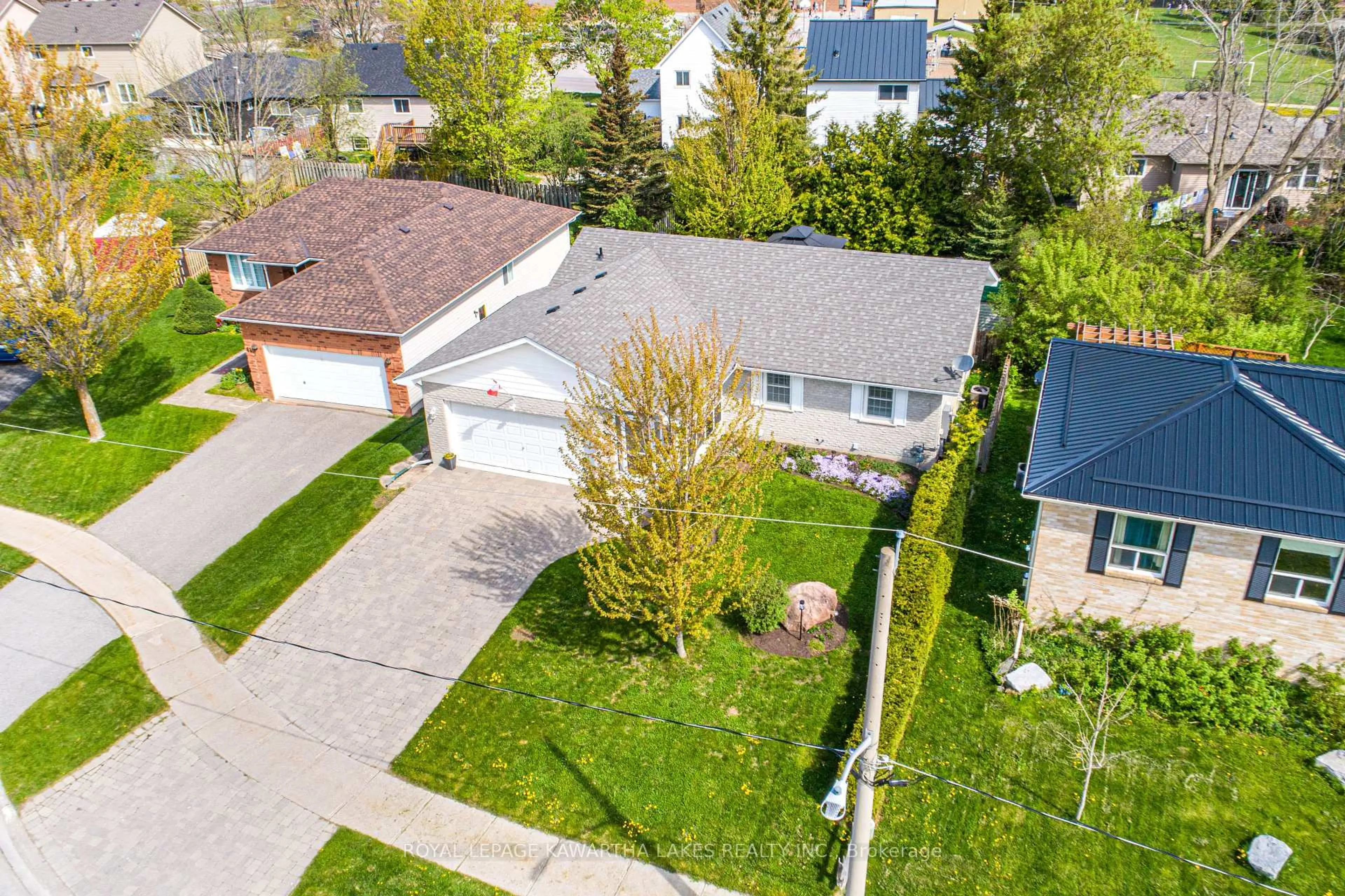 A pic from outside/outdoor area/front of a property/back of a property/a pic from drone, street for 83 Lori Blvd, Kawartha Lakes Ontario K9V 6V7