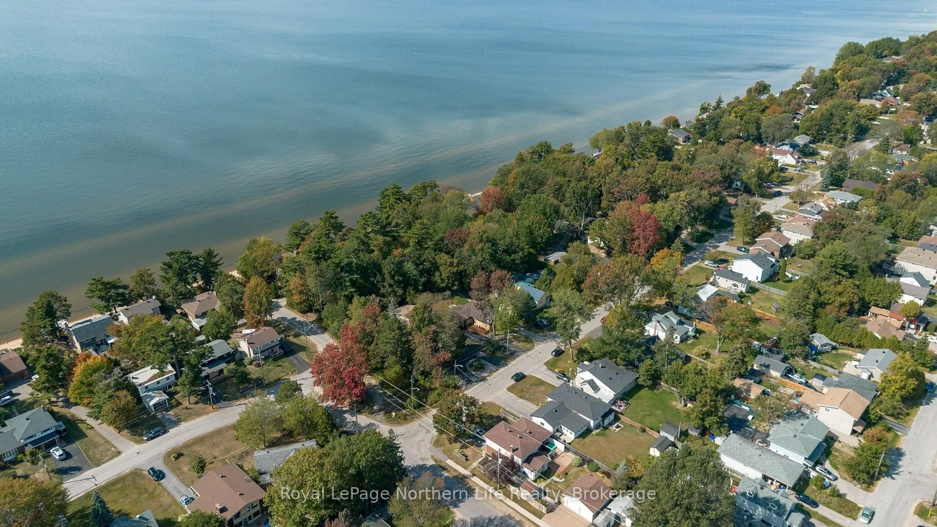 A pic from outside/outdoor area/front of a property/back of a property/a pic from drone, water/lake/river/ocean view for 171 Campbell Ave, North Bay Ontario P1A 1W2