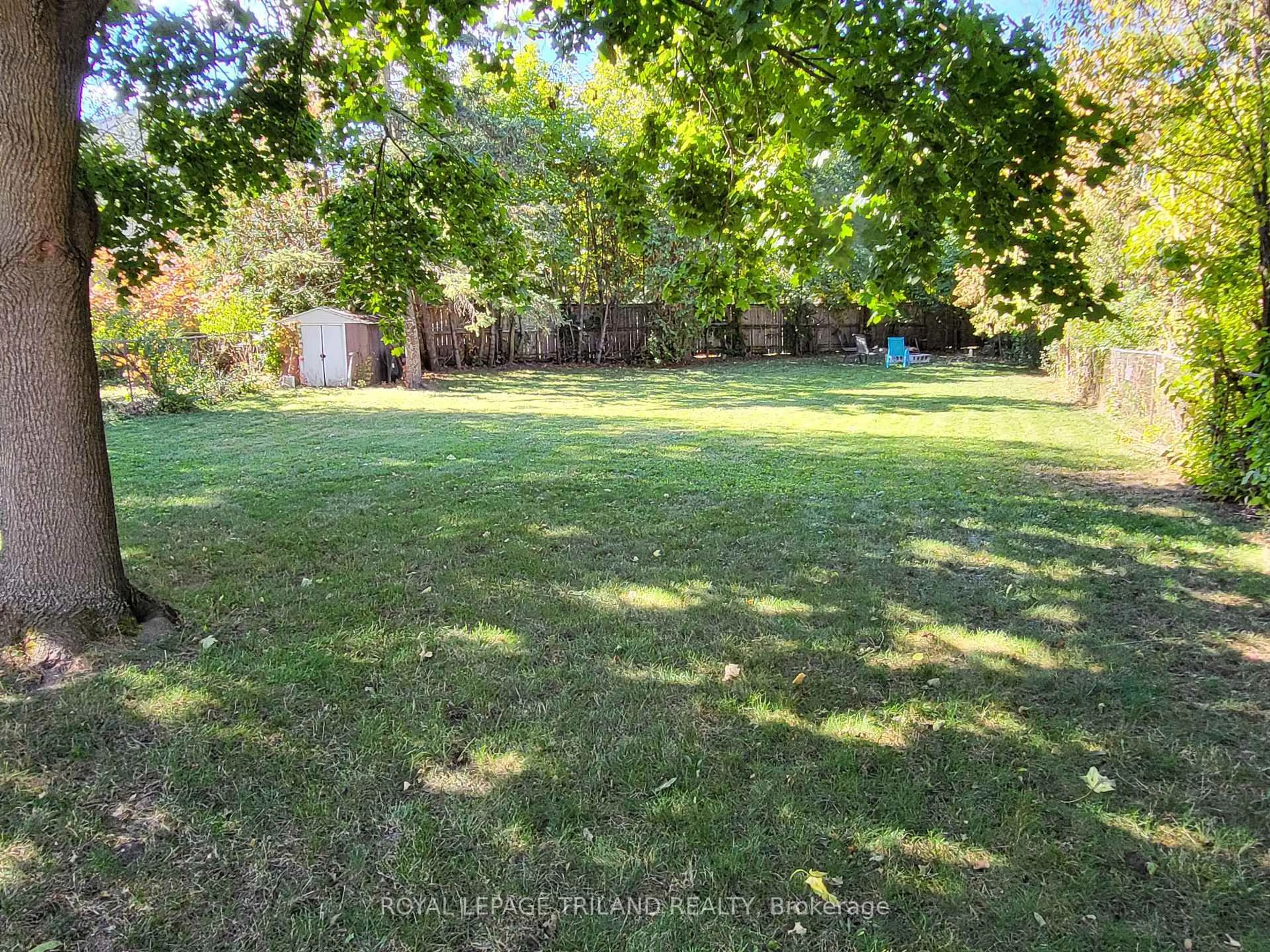 A pic from outside/outdoor area/front of a property/back of a property/a pic from drone, forest/trees view for 30 Culver Crt, London East Ontario N5V 3E8