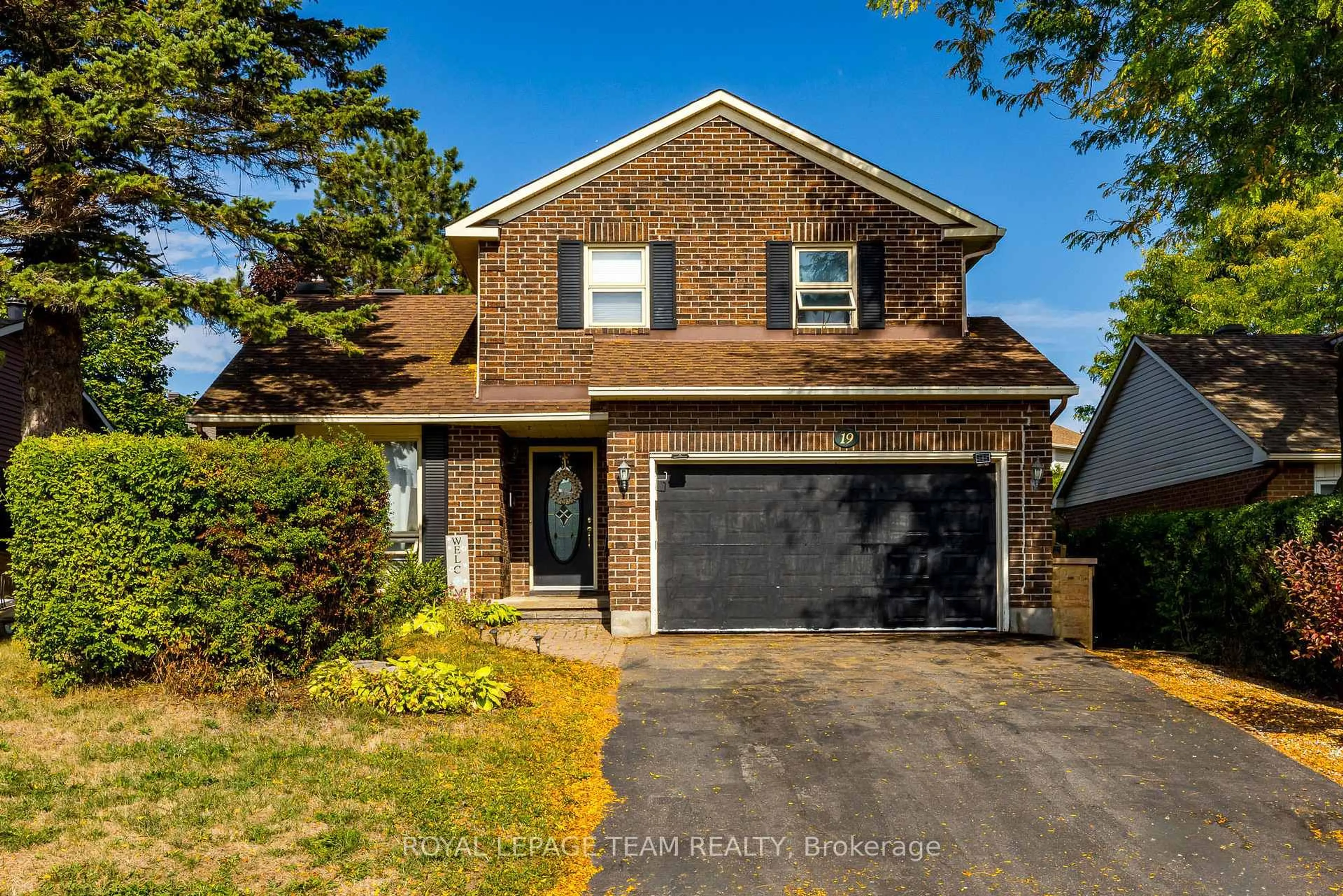Home with brick exterior material, street for 19 McLennan Way, Kanata Ontario K2L 2N1