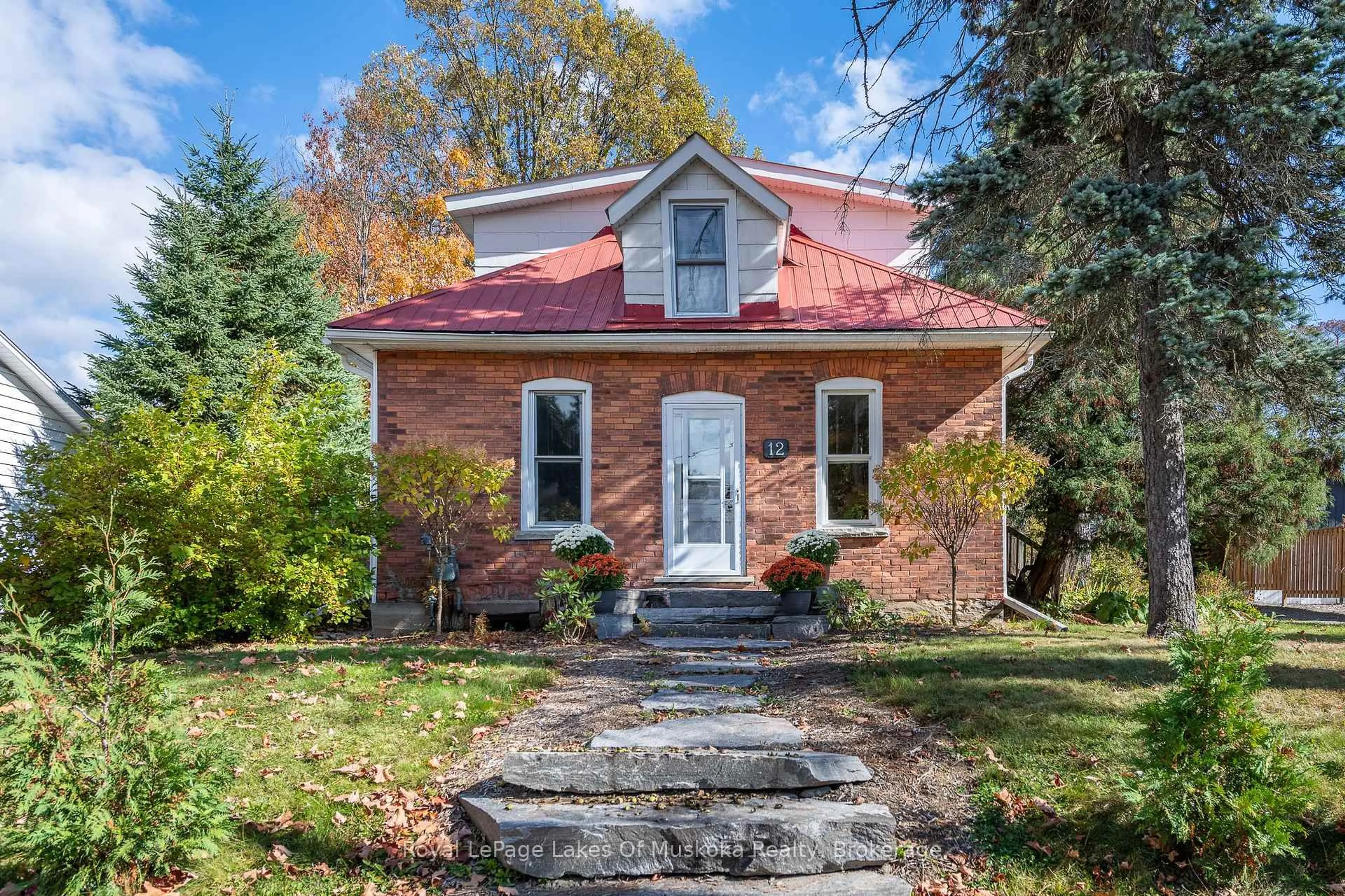 Home with brick exterior material, street for 12 Elm St, Huntsville Ontario P1H 1L1