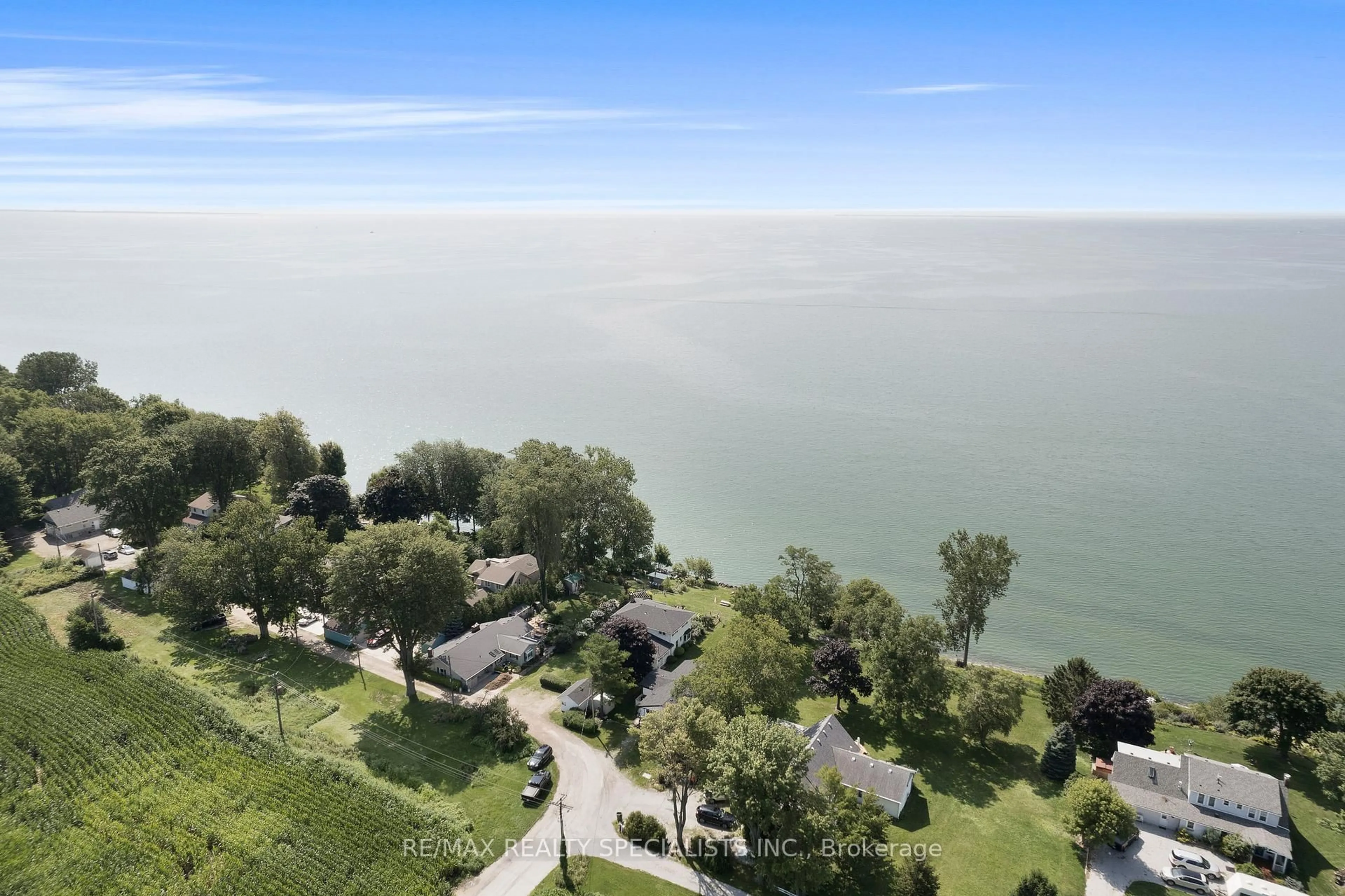 A pic from outside/outdoor area/front of a property/back of a property/a pic from drone, water/lake/river/ocean view for 659 McCracken Rd, Kingsville Ontario N9Y 2N9