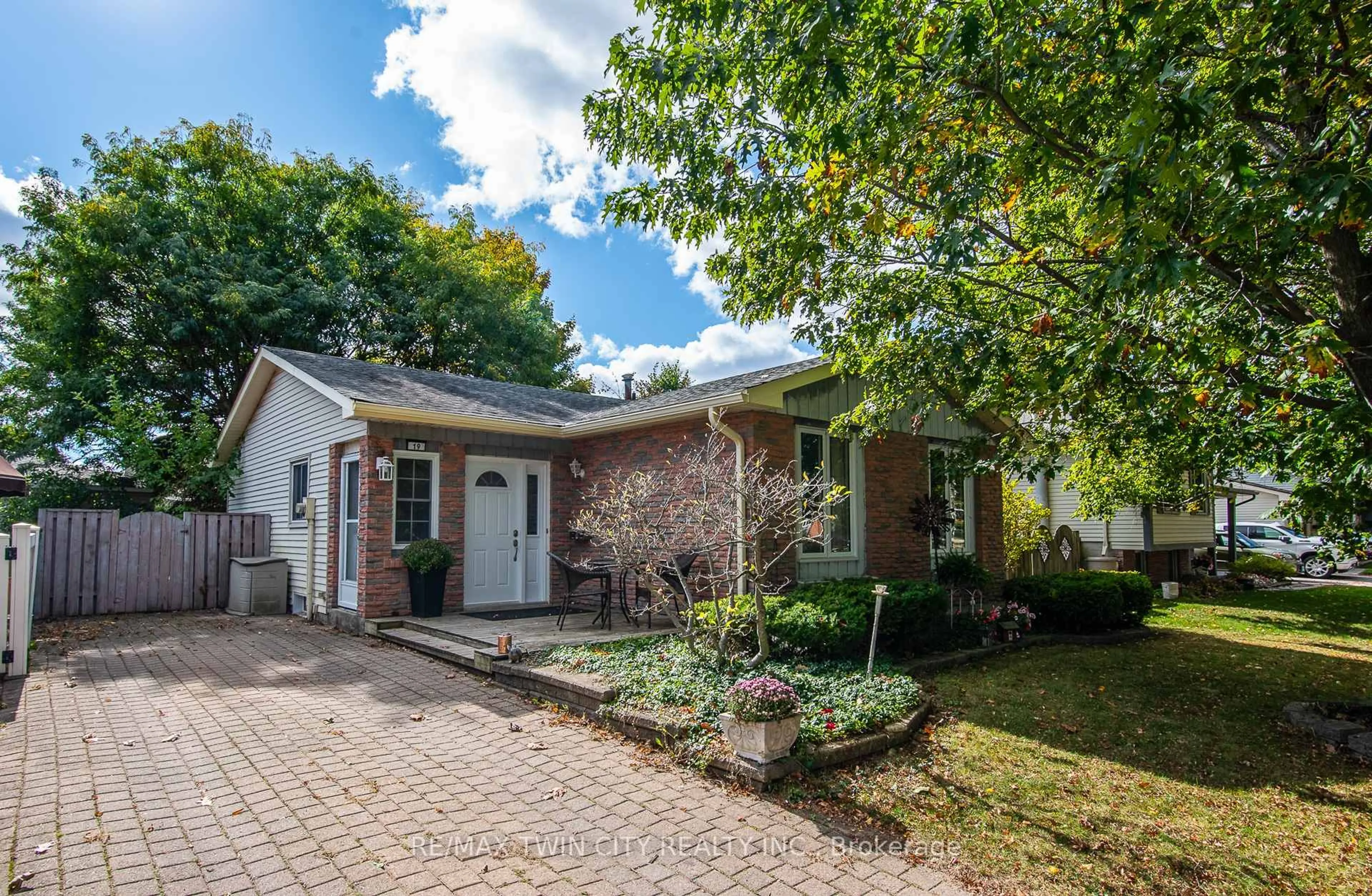 Home with brick exterior material, street for 19 Keewatin Ave, Kitchener Ontario N2B 3M1