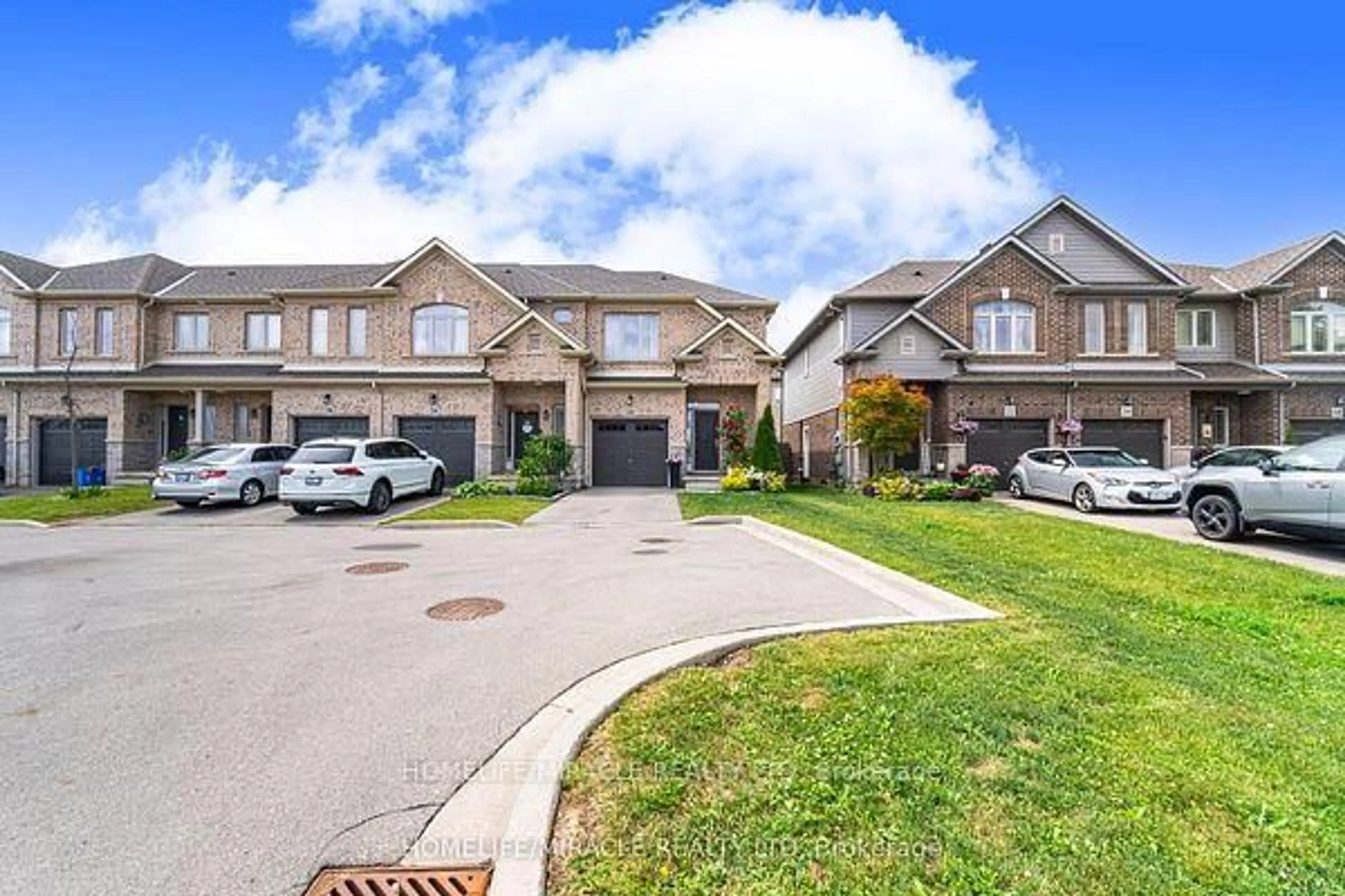 A pic from outside/outdoor area/front of a property/back of a property/a pic from drone, street for 24 Kingsborough Dr, Hamilton Ontario L0R 1P0