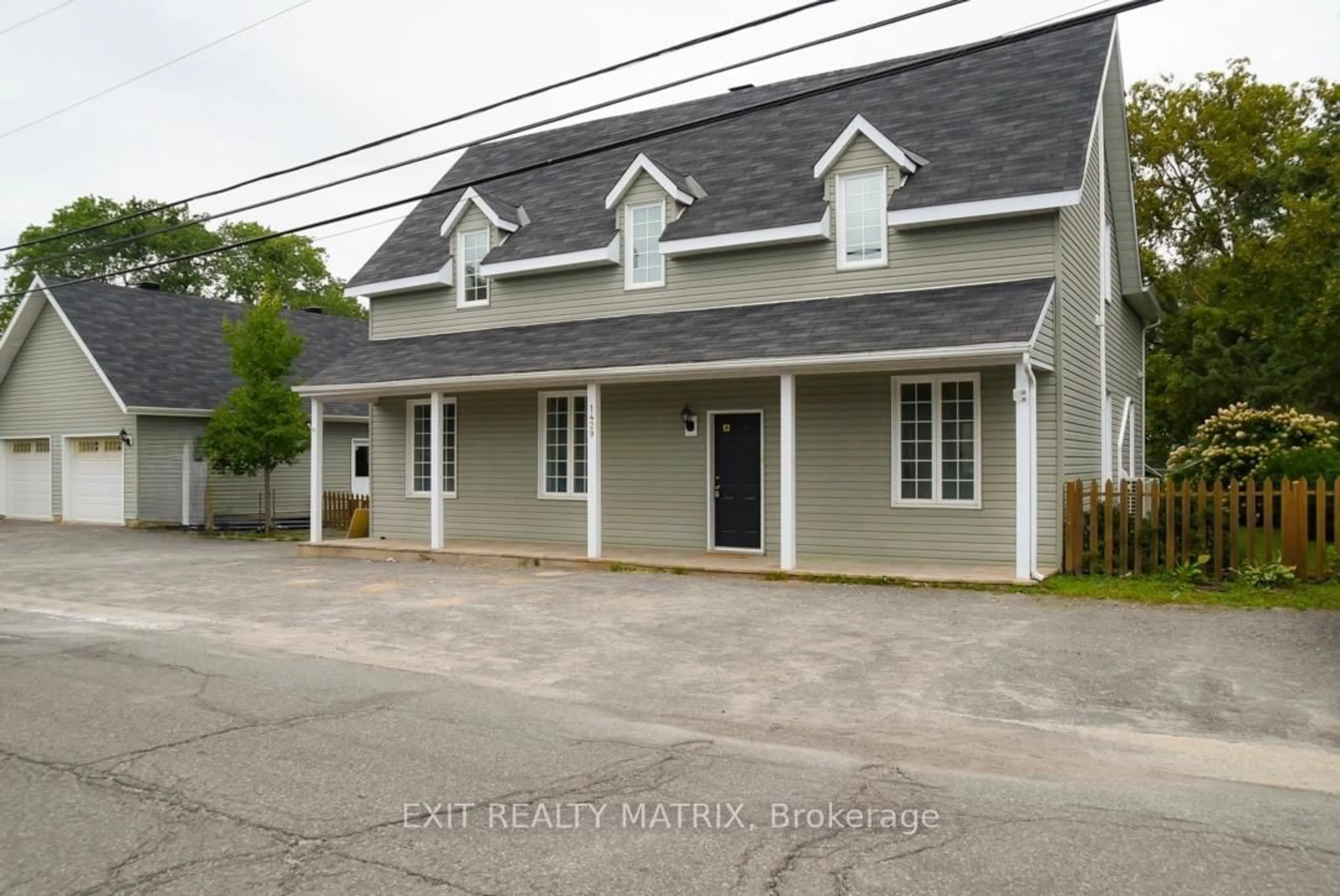 Home with vinyl exterior material, street for 1429 Meadow Dr, Ottawa Ontario K4P 1B1