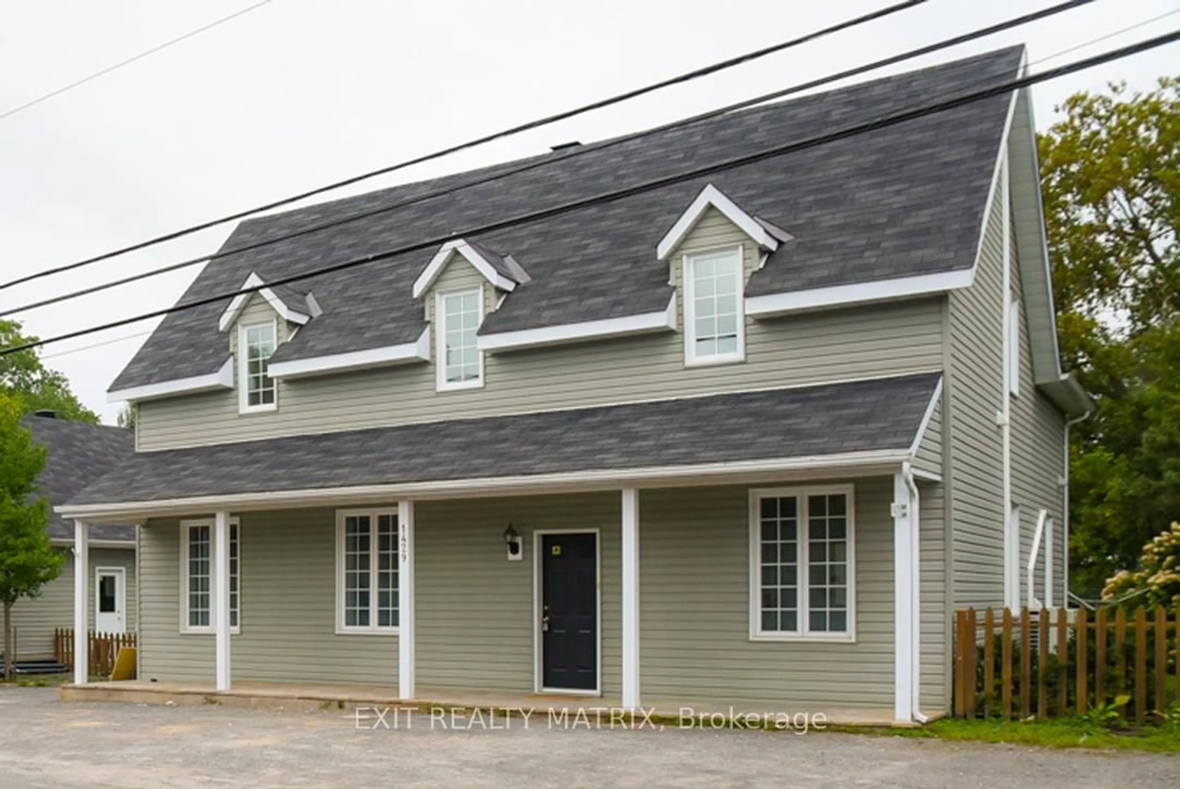 Home with vinyl exterior material, street for 1429 Meadow Dr, Ottawa Ontario K4P 1B1