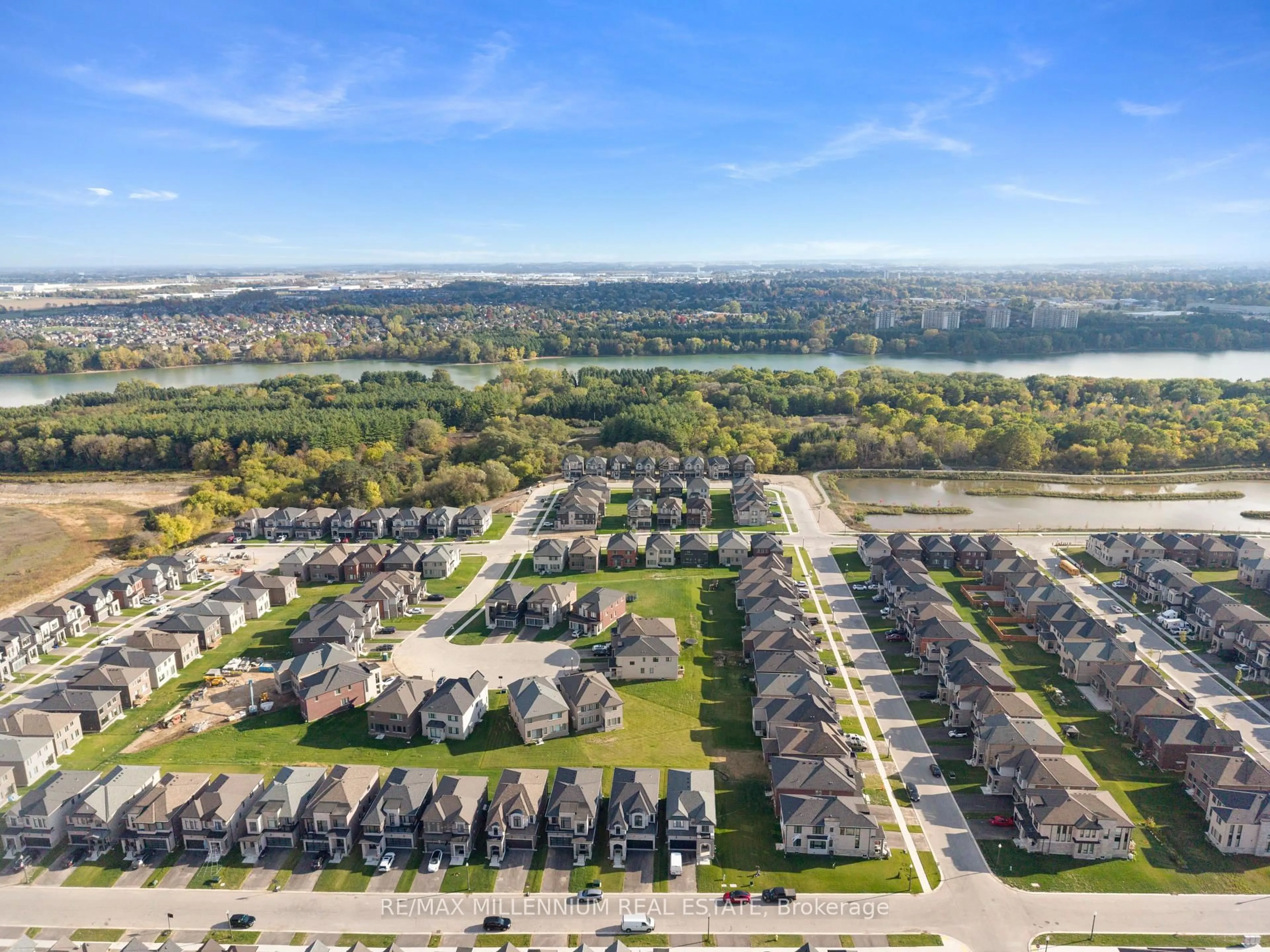A pic from outside/outdoor area/front of a property/back of a property/a pic from drone, water/lake/river/ocean view for 816 Knights Lane, Woodstock Ontario N4T 0P3