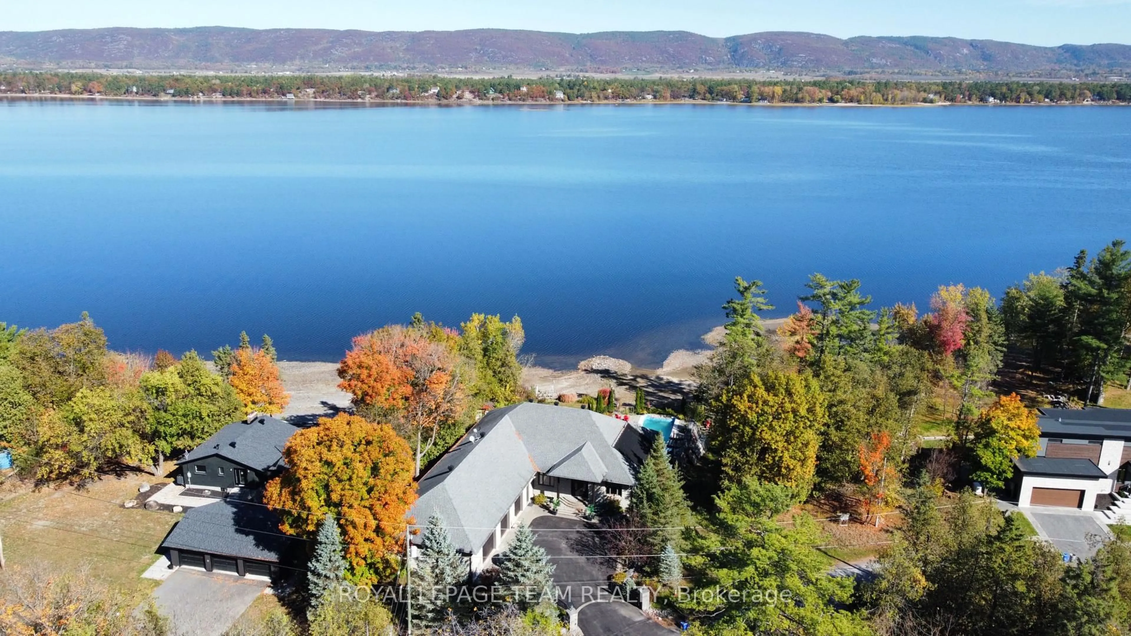 A pic from outside/outdoor area/front of a property/back of a property/a pic from drone, water/lake/river/ocean view for 3886 Armitage Ave, Ottawa Ontario K0A 1T0