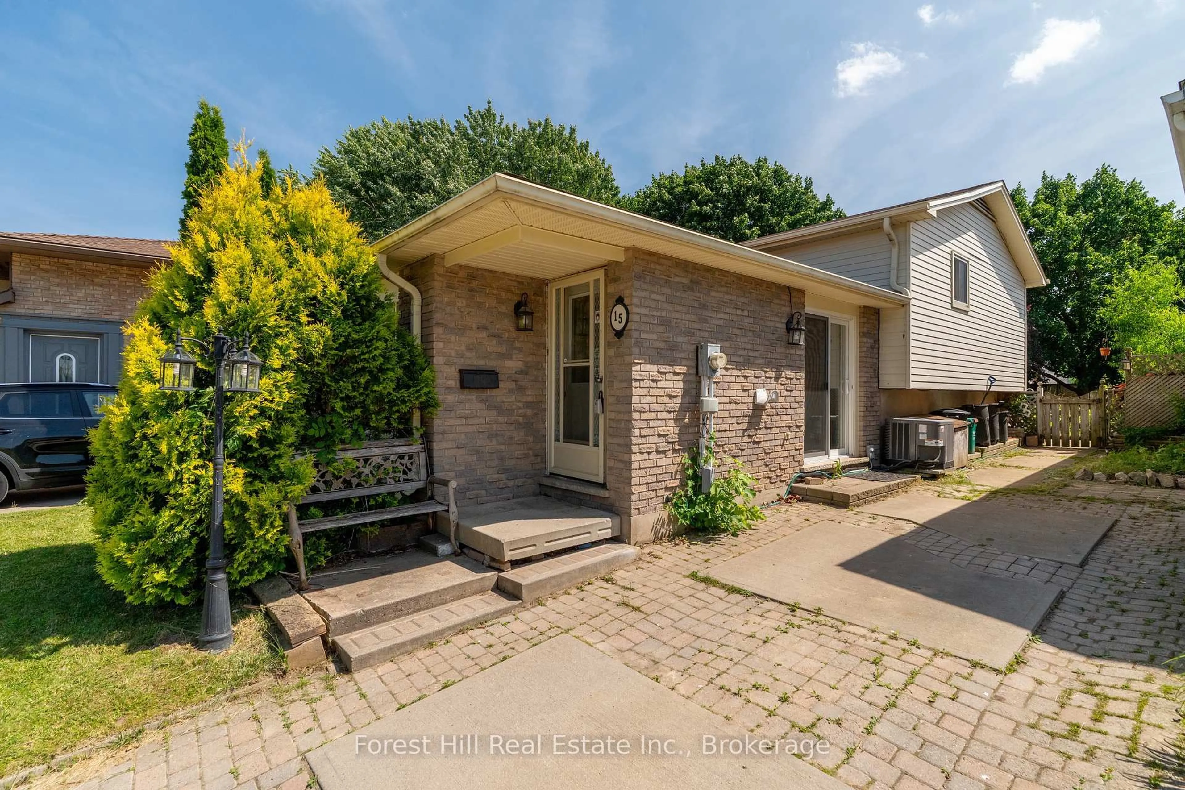 Home with brick exterior material, street for 15 Homestead Pl, Kitchener Ontario N2N 1Z1