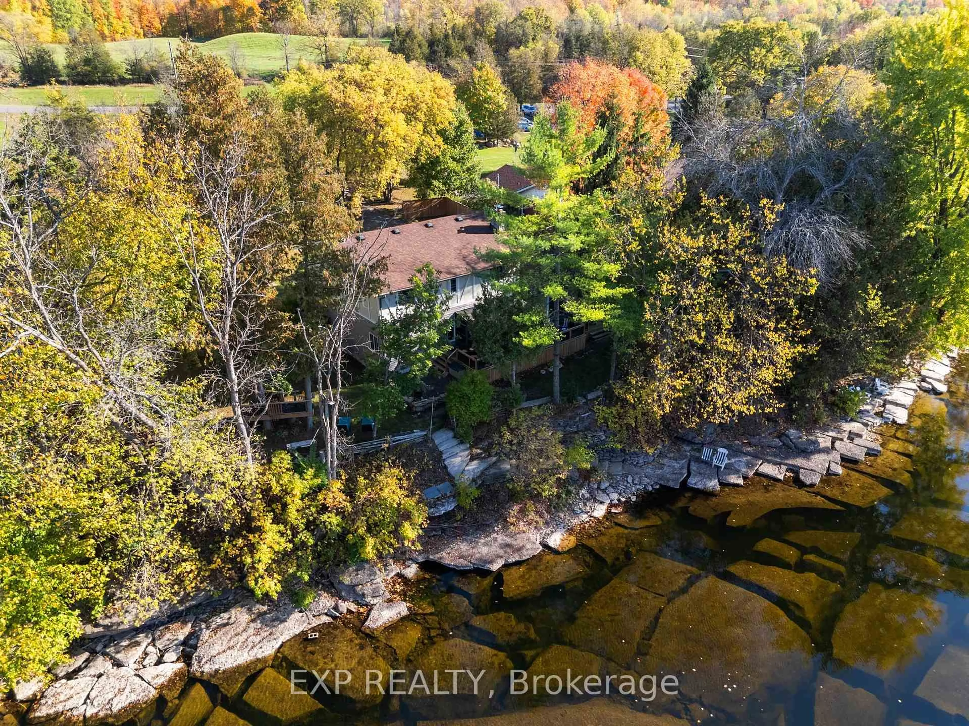 A pic from outside/outdoor area/front of a property/back of a property/a pic from drone, water/lake/river/ocean view for 587 Scuttlehole Rd, Belleville Ontario K0K 2V0