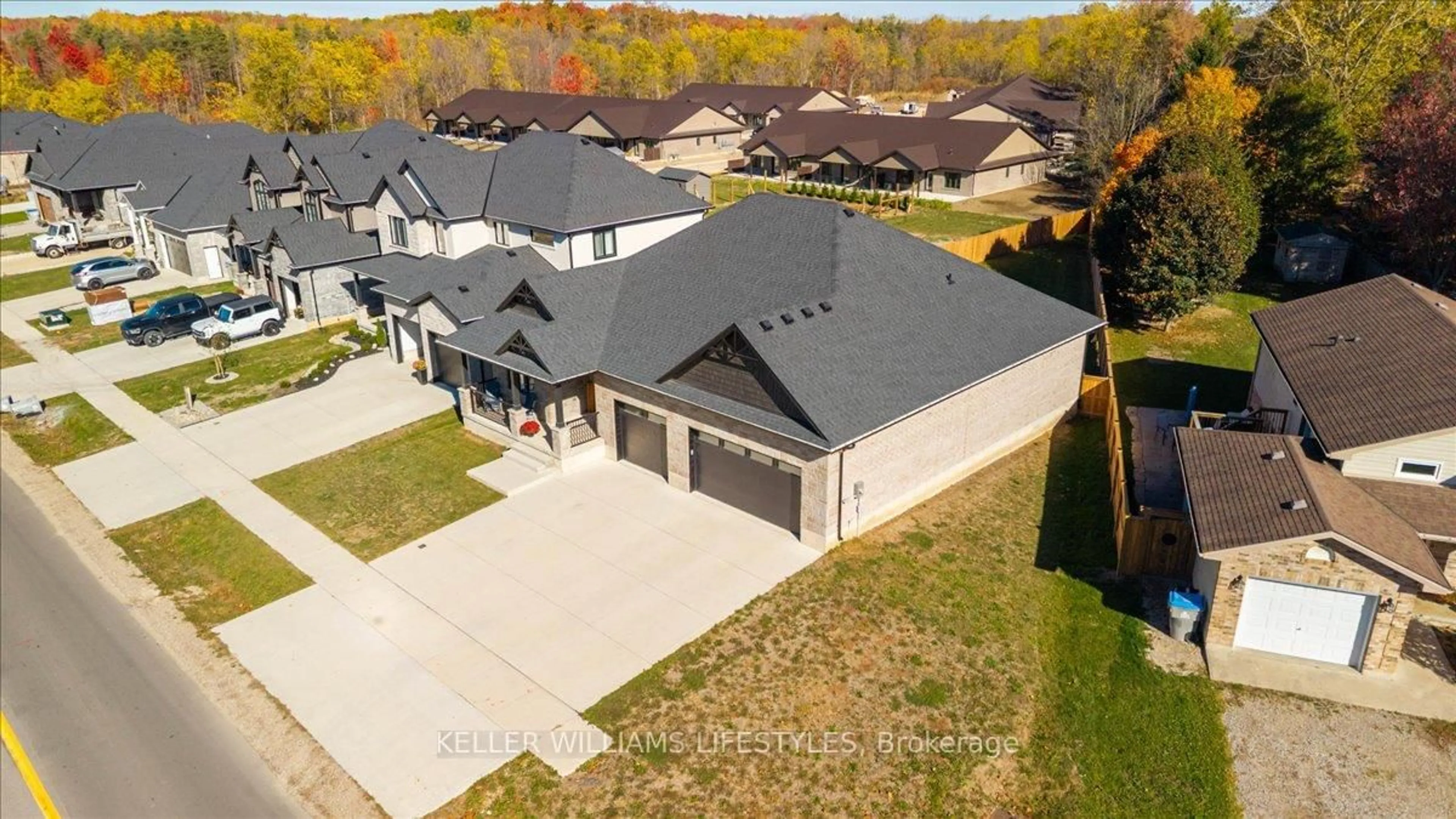 A pic from outside/outdoor area/front of a property/back of a property/a pic from drone, street for 92 Queen St, North Middlesex Ontario N0M 1A0