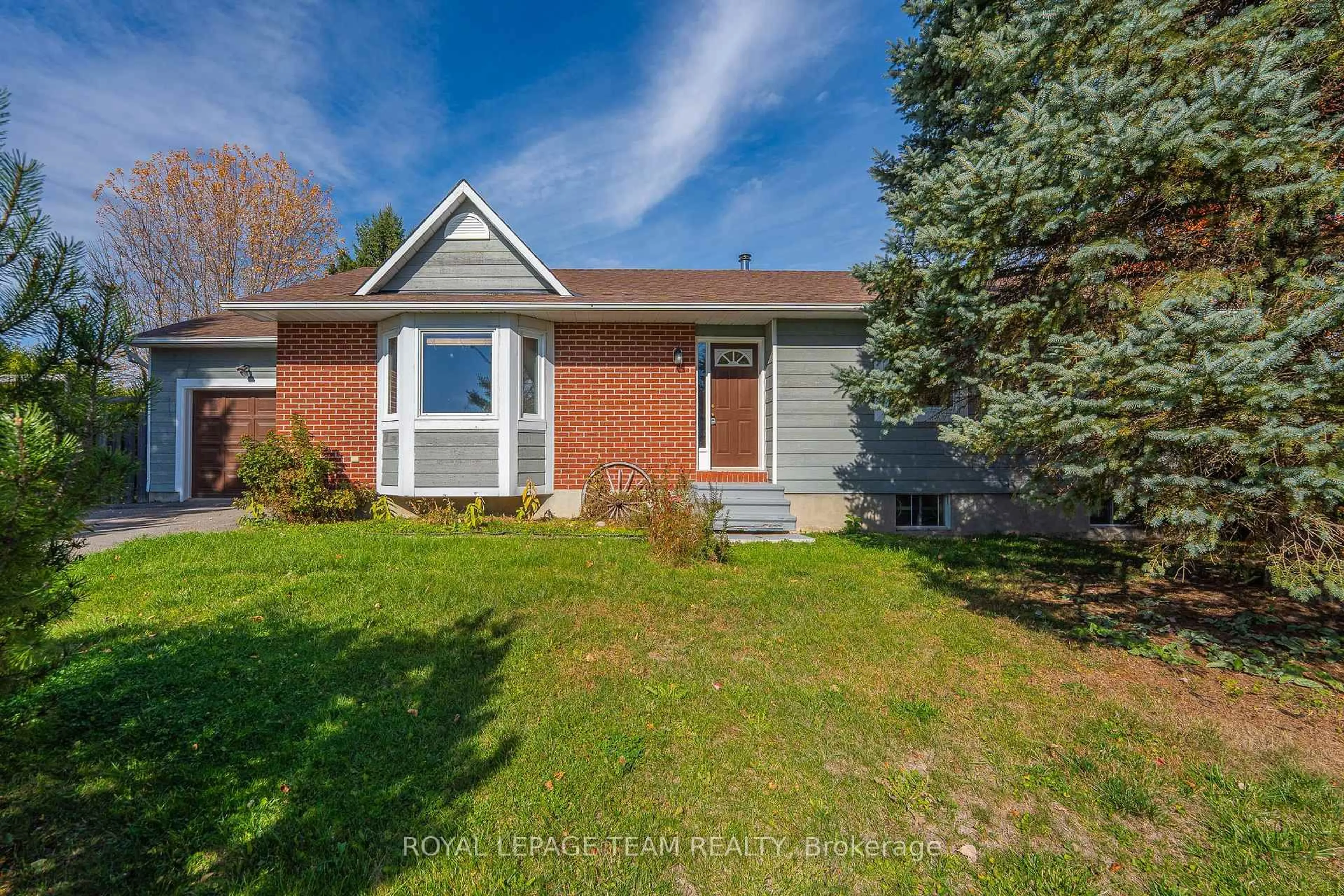 Home with brick exterior material, street for 106 Porcupine Tr, Ottawa Ontario K0A 1T0