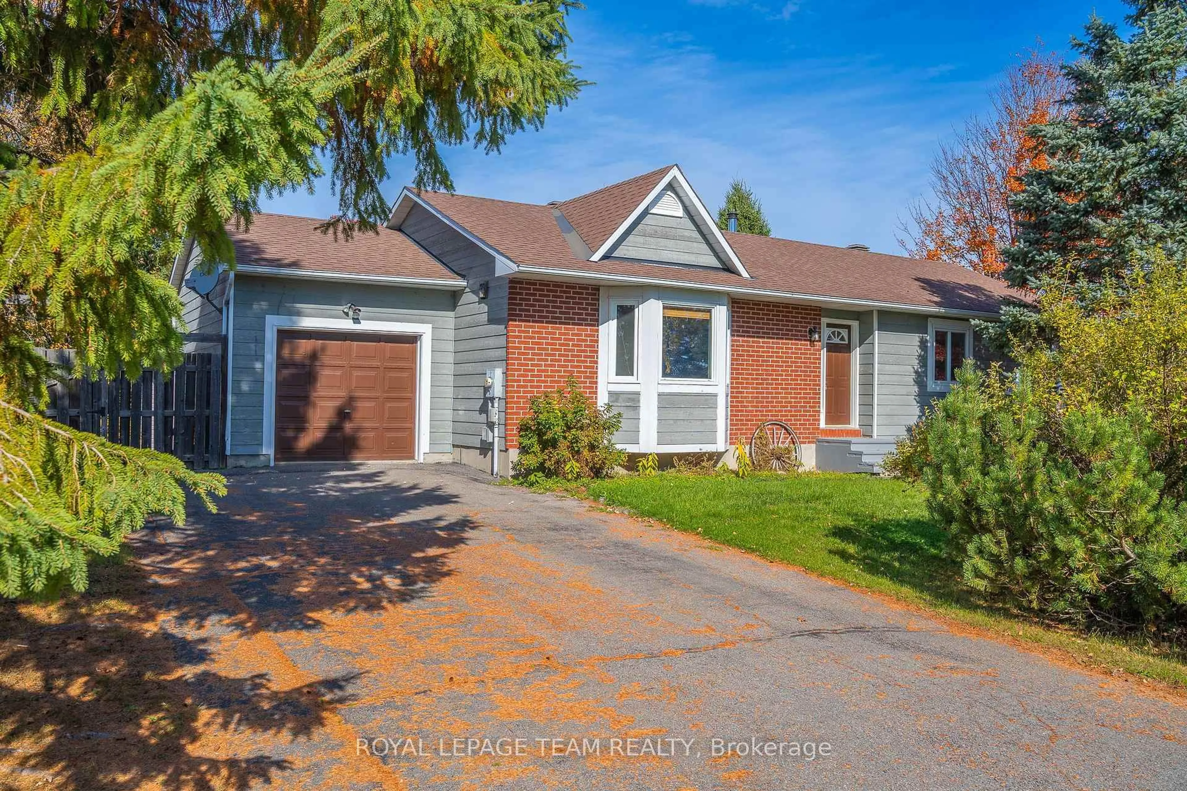 Home with brick exterior material, street for 106 Porcupine Tr, Ottawa Ontario K0A 1T0