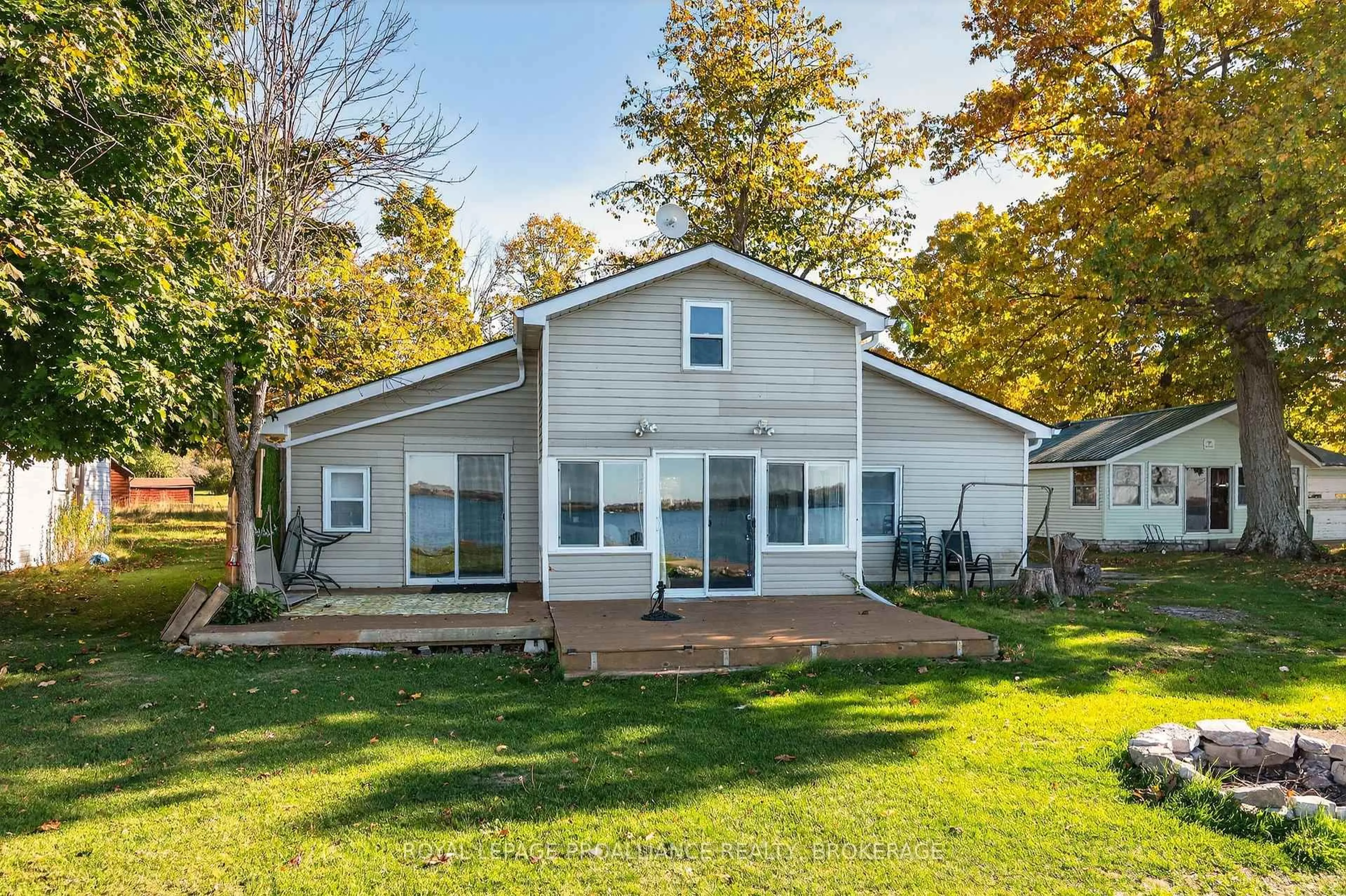 Home with vinyl exterior material, water/lake/river/ocean view for 14 Morgan's Point Lane #B, Wolfe Island Ontario K0H 2Y0