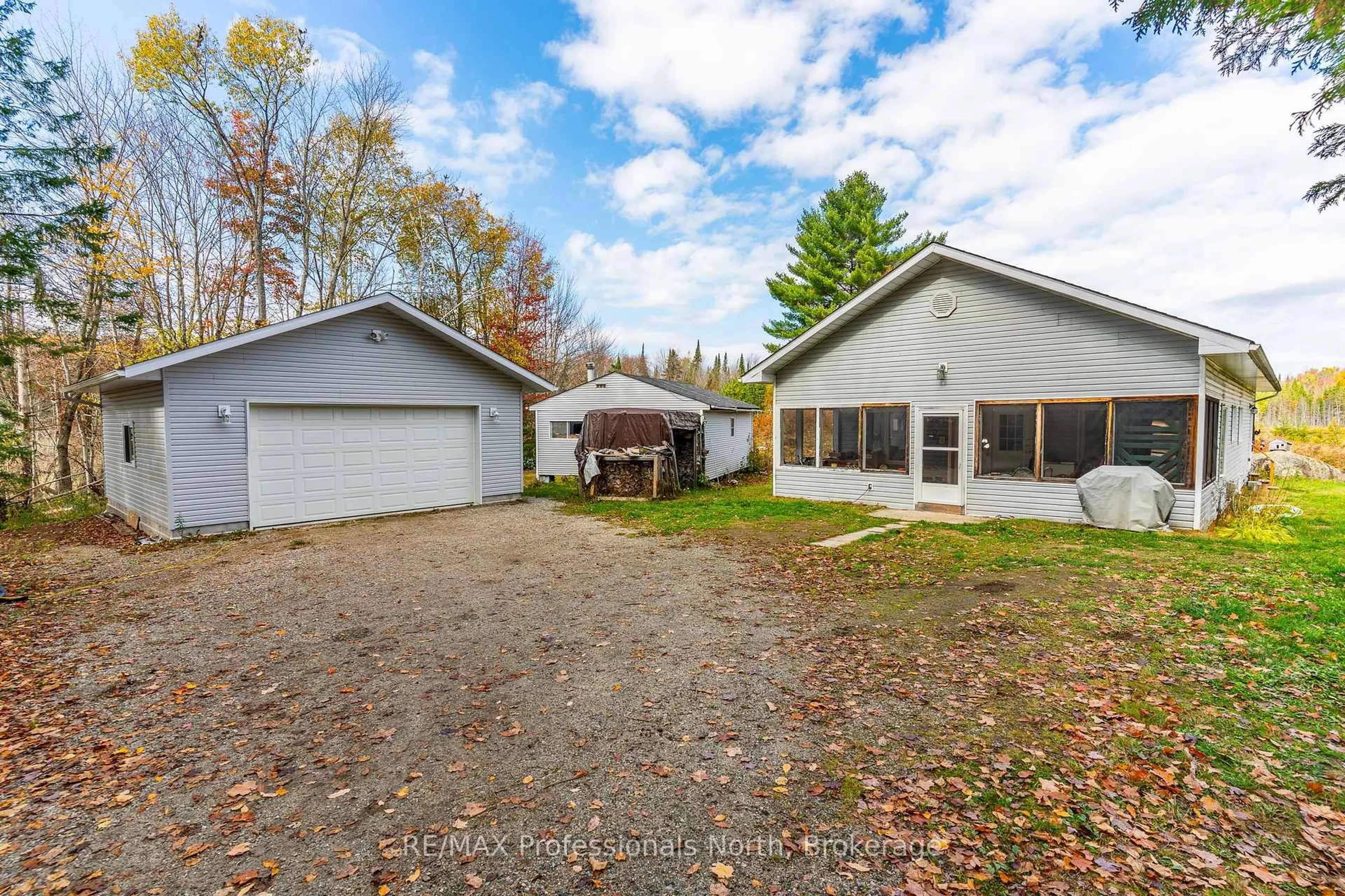 A pic from outside/outdoor area/front of a property/back of a property/a pic from drone, unknown for 2179 South Lake Rd, Minden Hills Ontario K0M 2K0