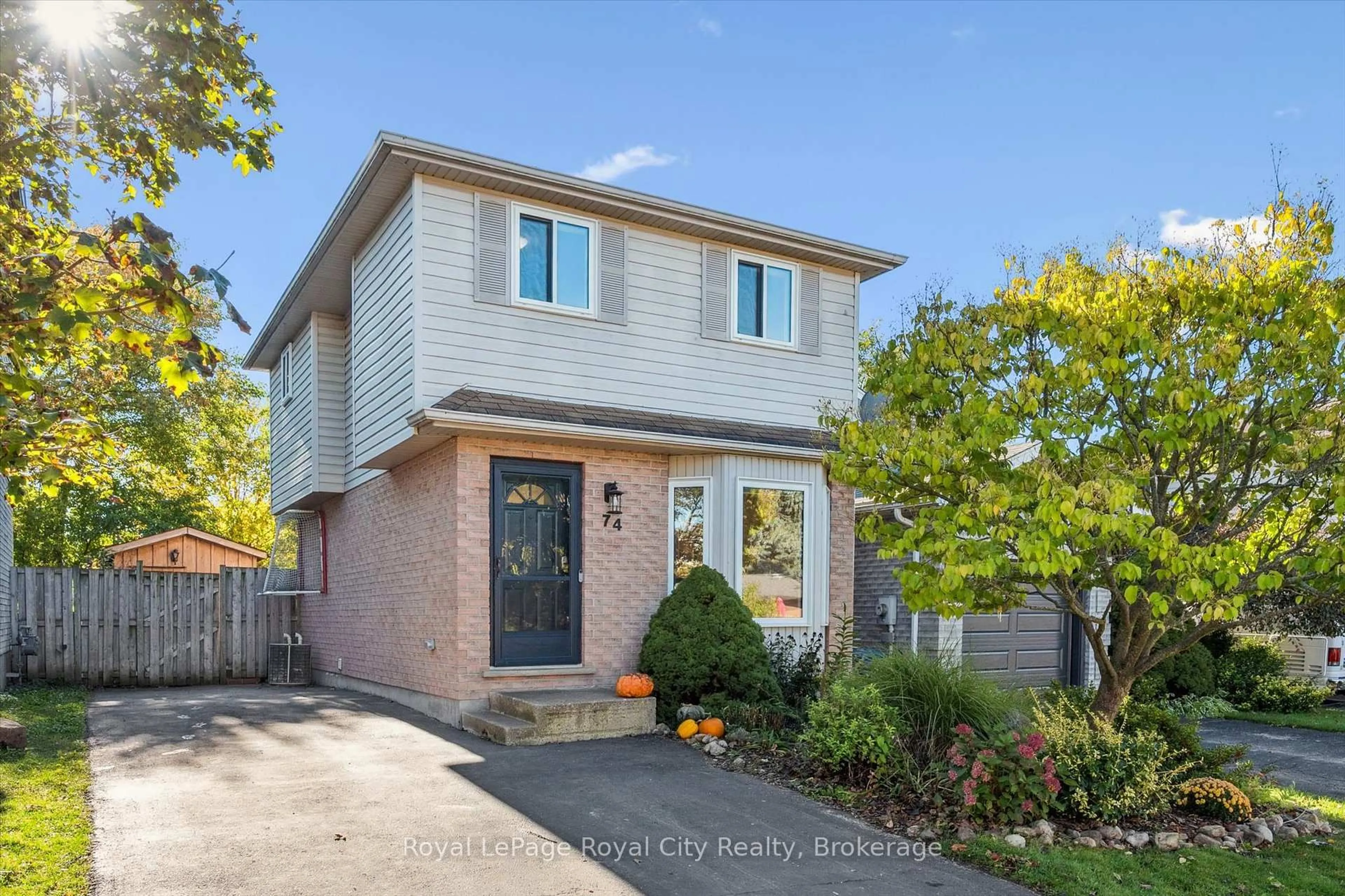 Home with brick exterior material, street for 74 Troy Cres, Guelph Ontario N1E 6W8