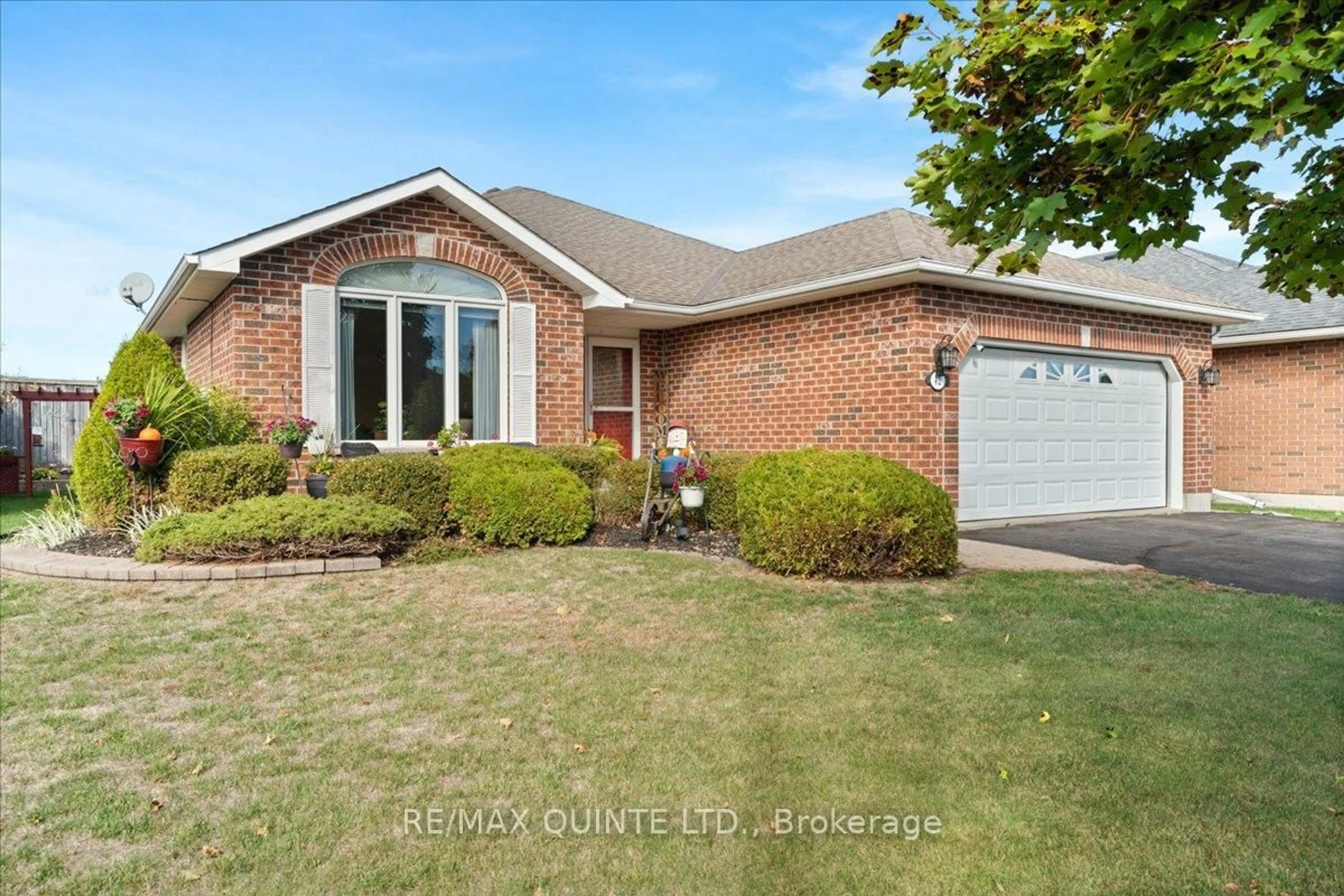 Home with brick exterior material, street for 42 Spruce Gdns, Belleville Ontario K8N 5Y6