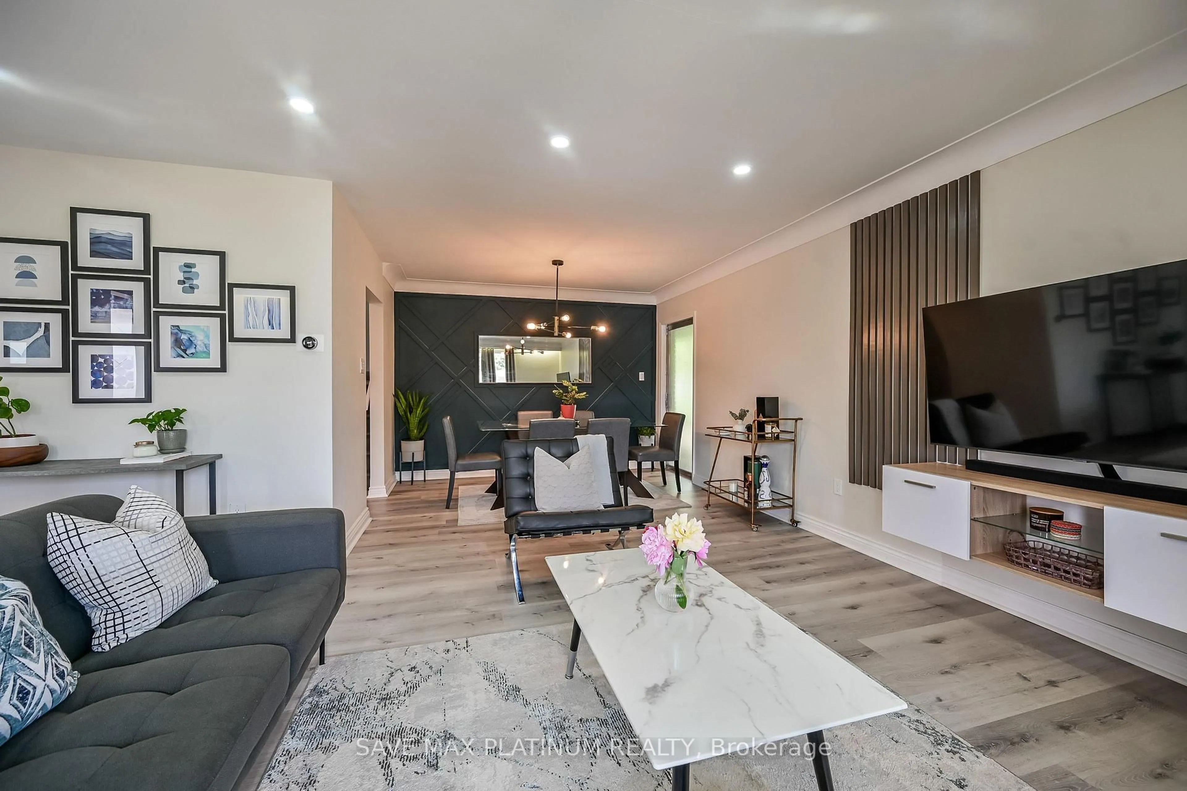 Living room with furniture, wood/laminate floor for 18 Gardenia Crt, Hamilton Ontario L8K 3X6