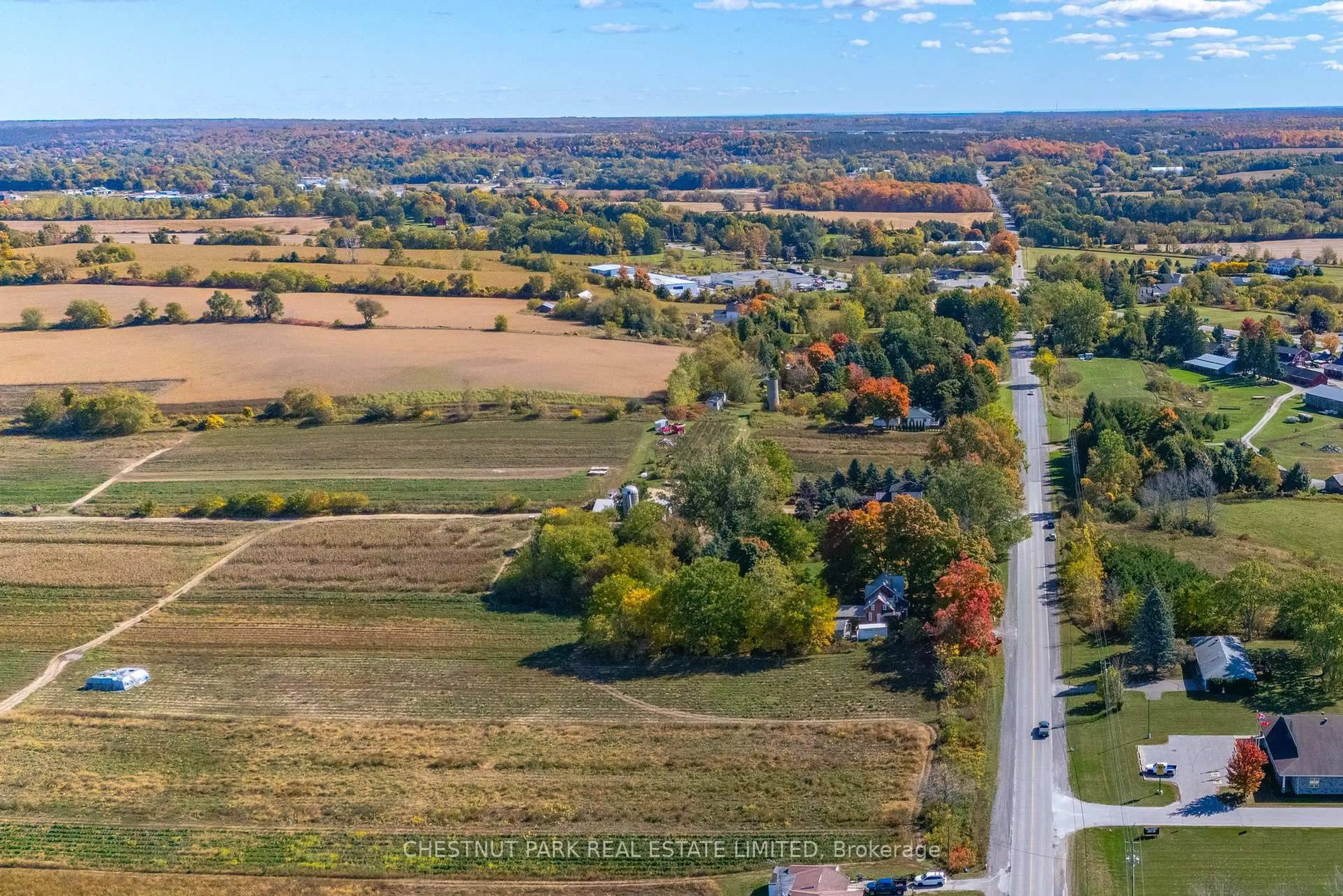 A pic from outside/outdoor area/front of a property/back of a property/a pic from drone, street for 550 County  Road 1, Prince Edward County Ontario K0K 2T0