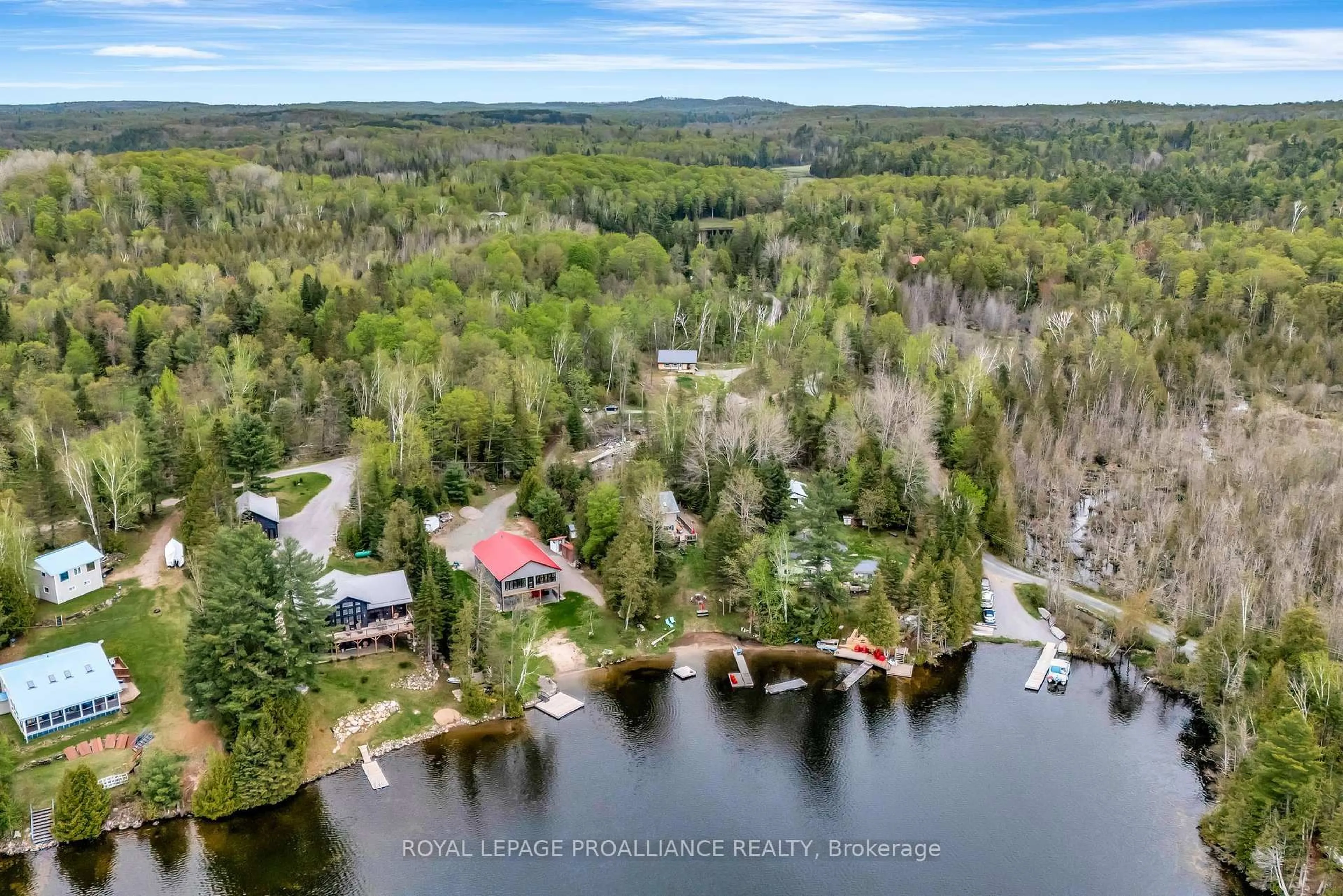 A pic from outside/outdoor area/front of a property/back of a property/a pic from drone, water/lake/river/ocean view for 34 Elm Lane, Hastings Ontario K0L 1W0