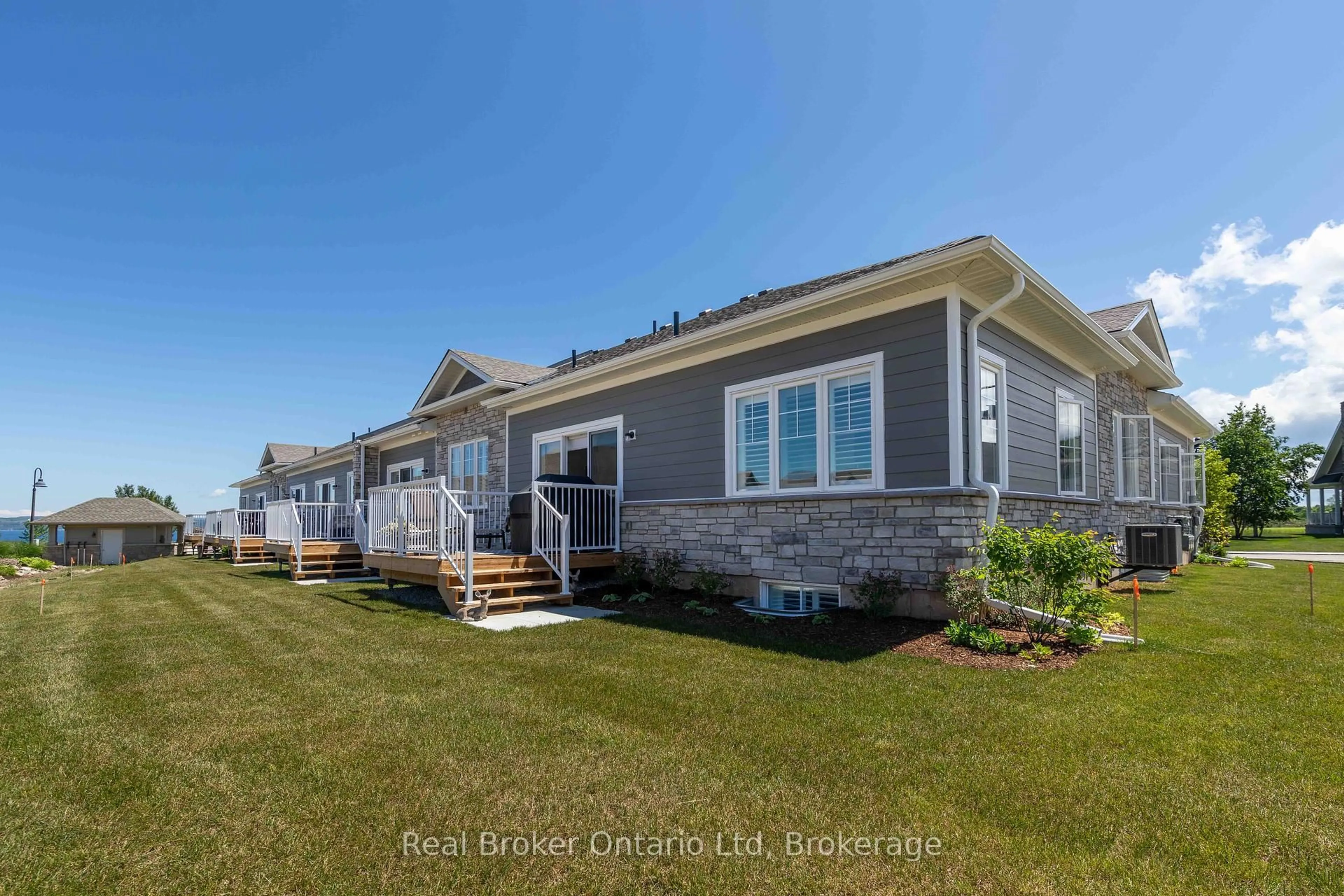 Home with vinyl exterior material, water/lake/river/ocean view for 221 Ironwood Way #18, Georgian Bluffs Ontario N0H 1S0