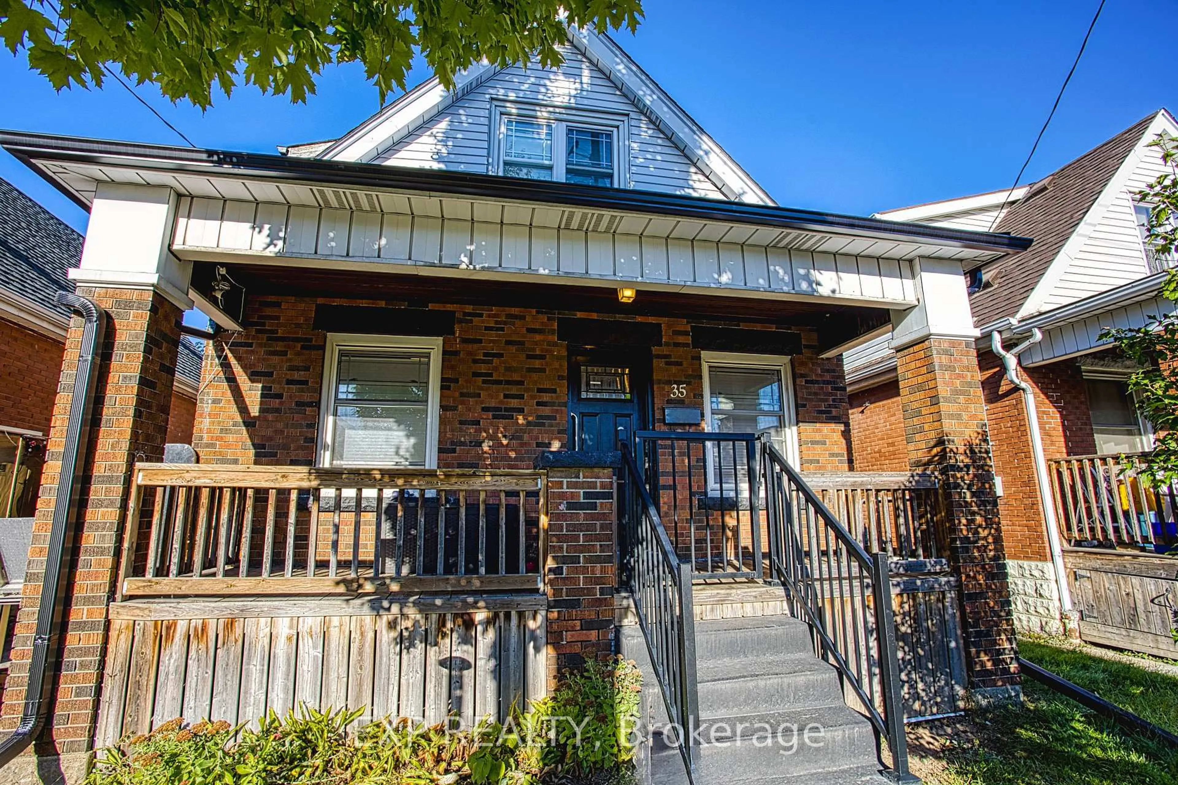 Home with brick exterior material, street for 35 Cope St, Hamilton Ontario L8H 5A8