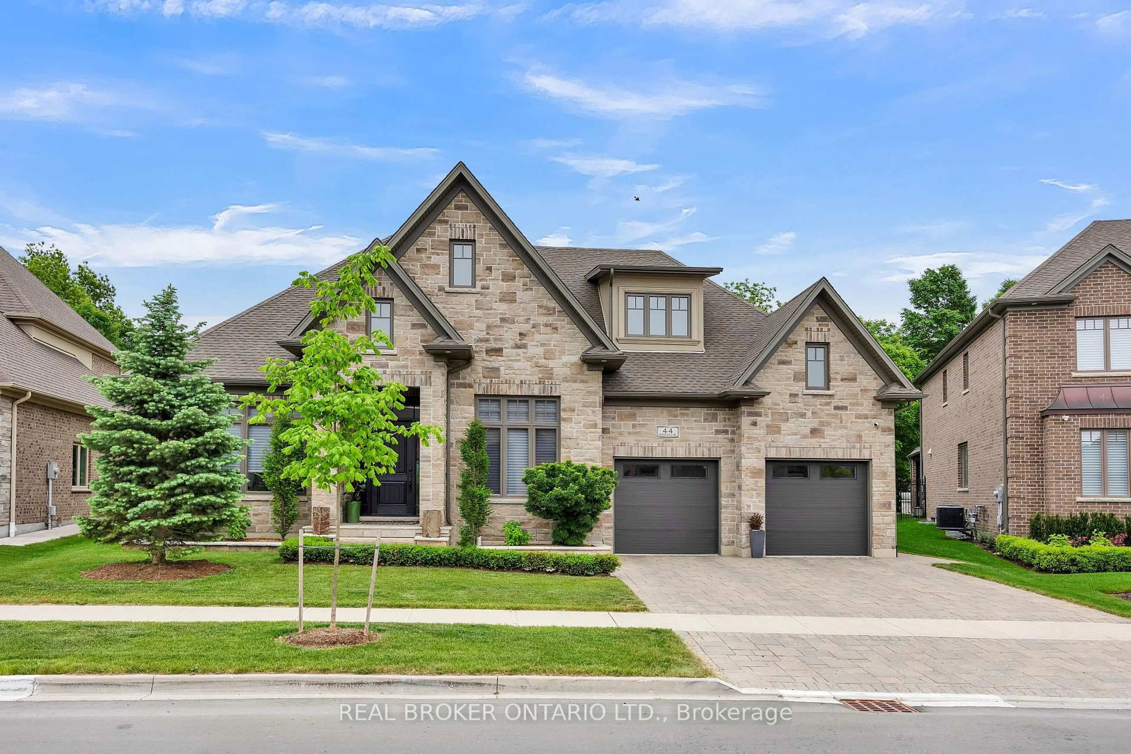 Home with brick exterior material, street for 44 Pioneer Ridge Dr, Kitchener Ontario N2P 0G6
