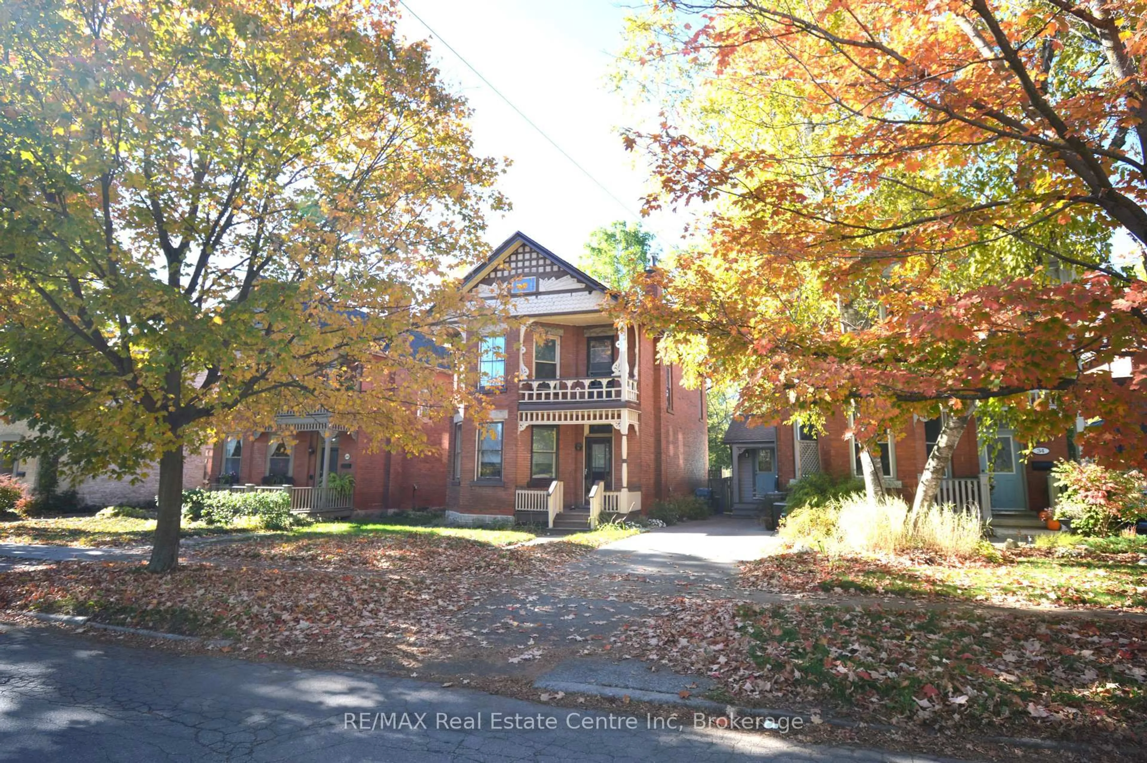 Home with brick exterior material, street for 30 Glasgow St, Guelph Ontario N1H 4V5