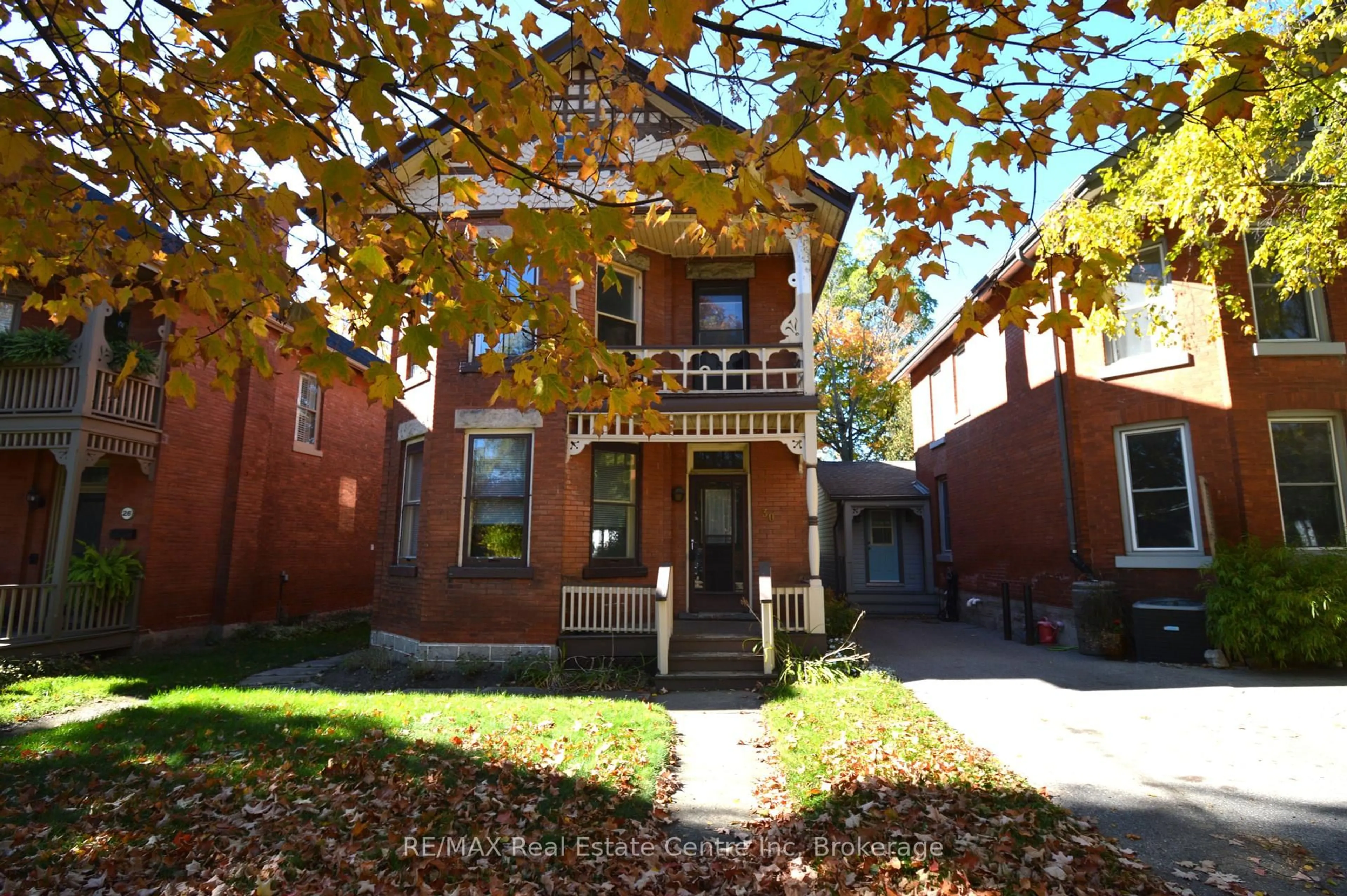 Home with brick exterior material, street for 30 Glasgow St, Guelph Ontario N1H 4V5