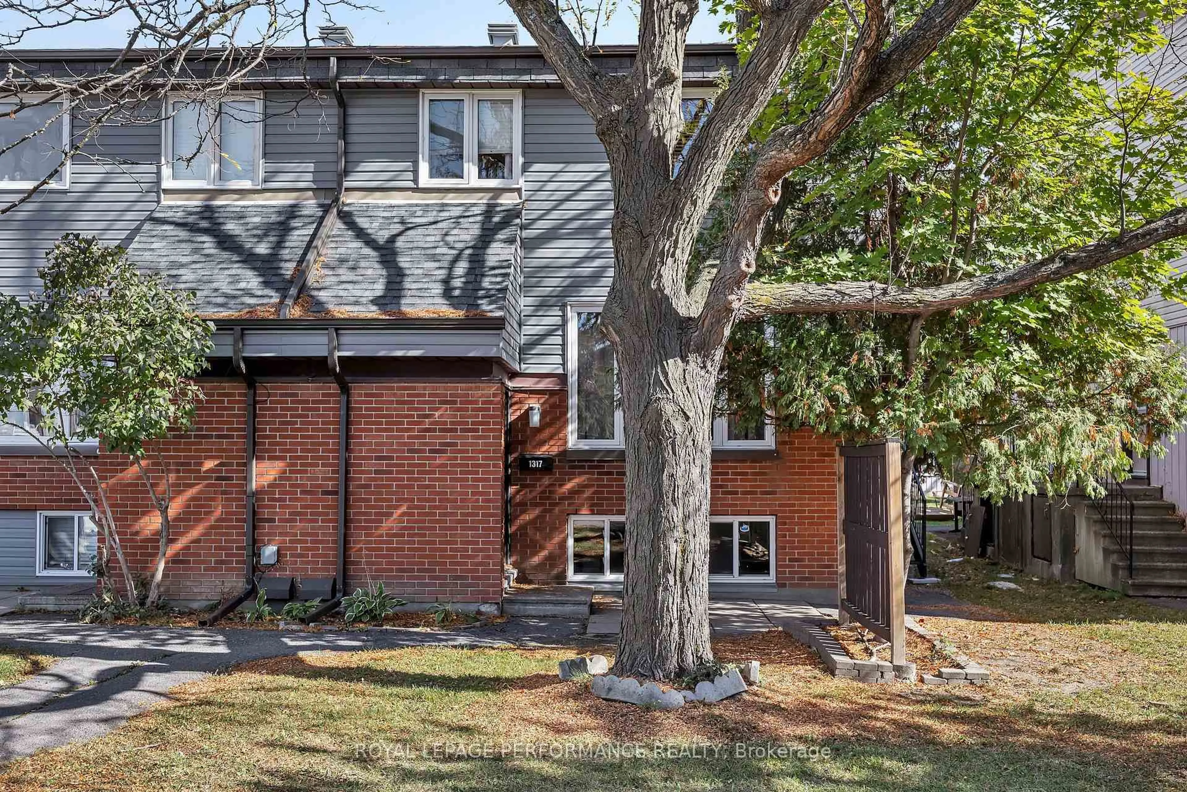 Home with brick exterior material, street for 1317 Marigold Cres #84, Ottawa Ontario K1B 5E7