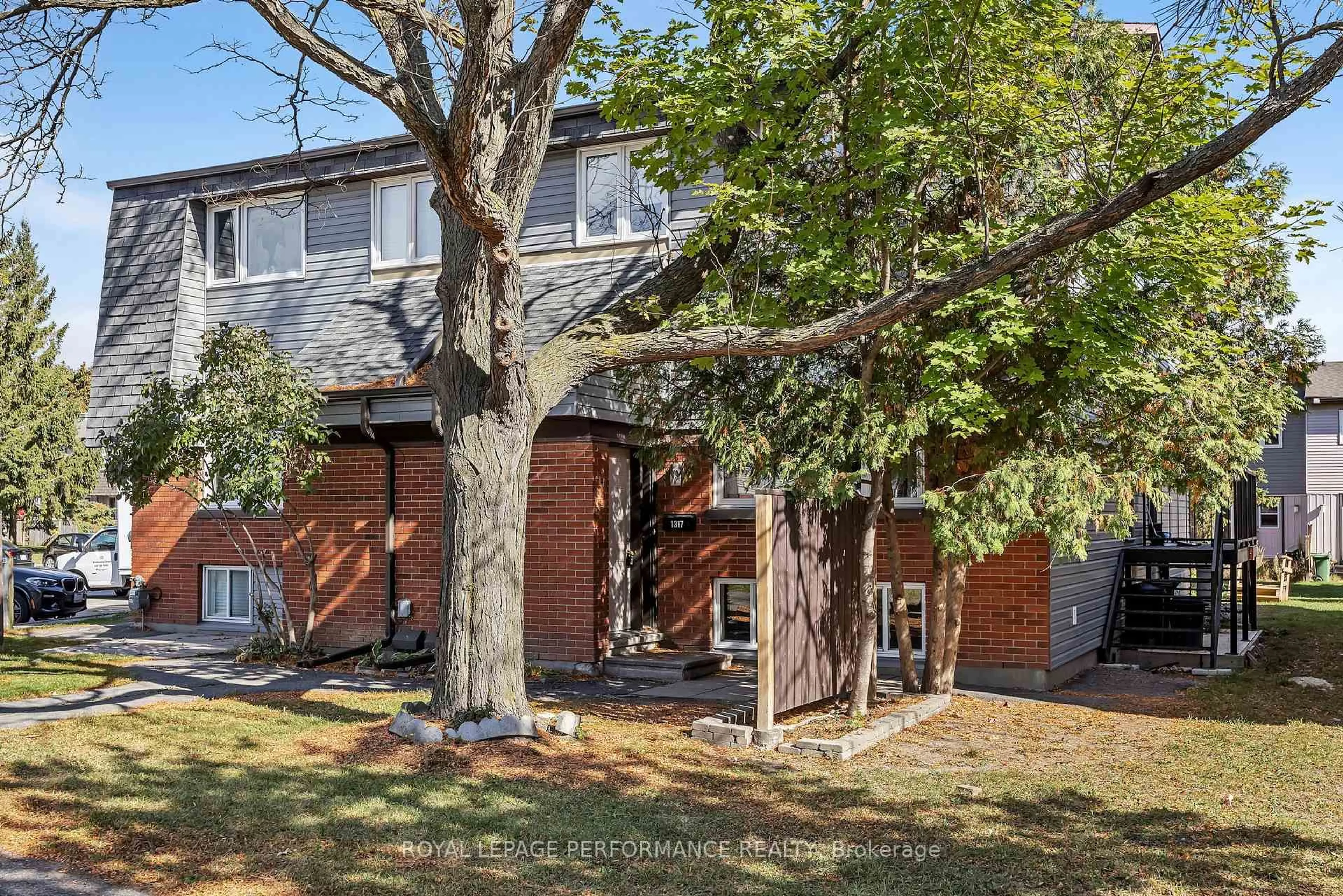Home with brick exterior material, street for 1317 Marigold Cres #84, Ottawa Ontario K1B 5E7