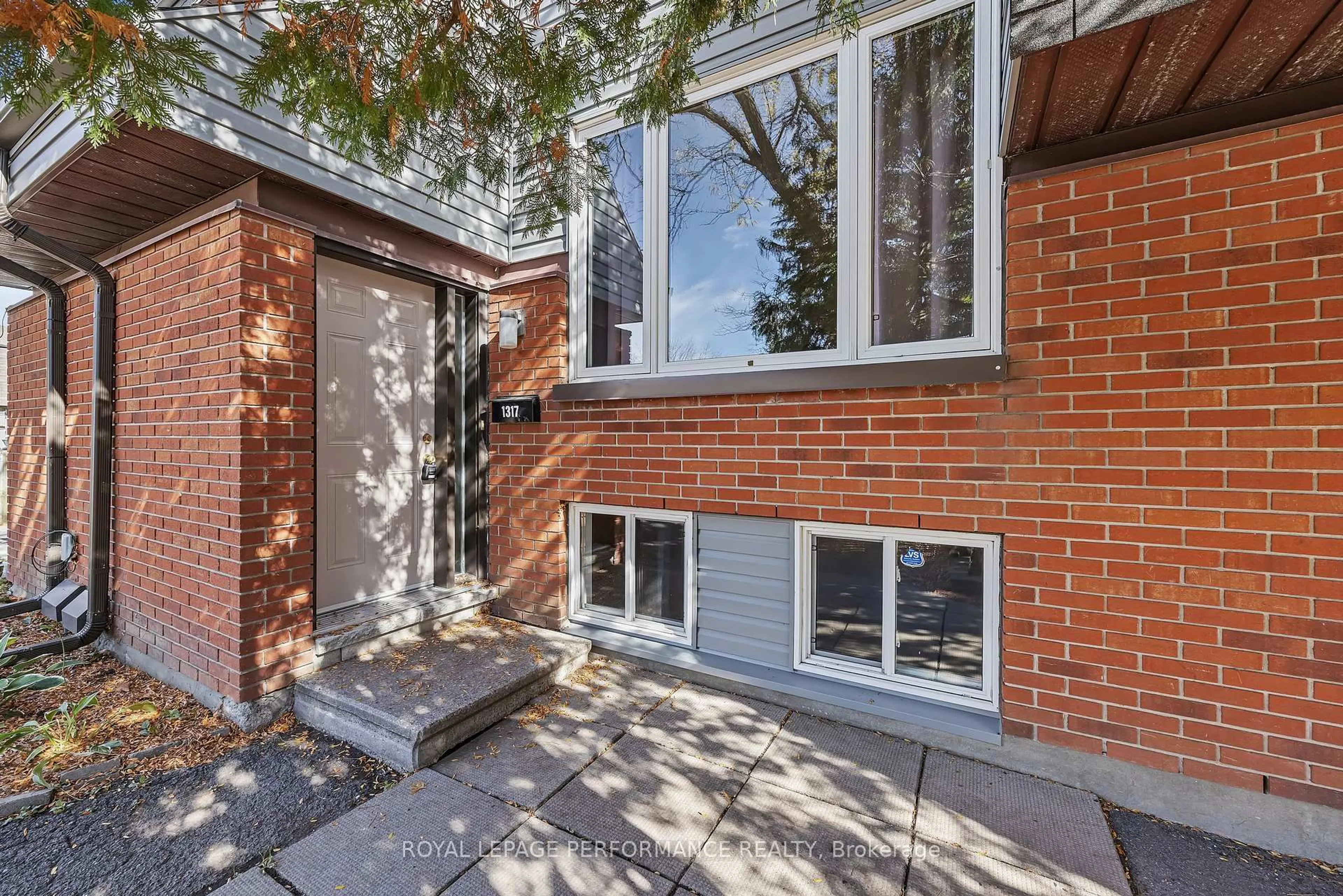 Home with brick exterior material, street for 1317 Marigold Cres #84, Ottawa Ontario K1B 5E7