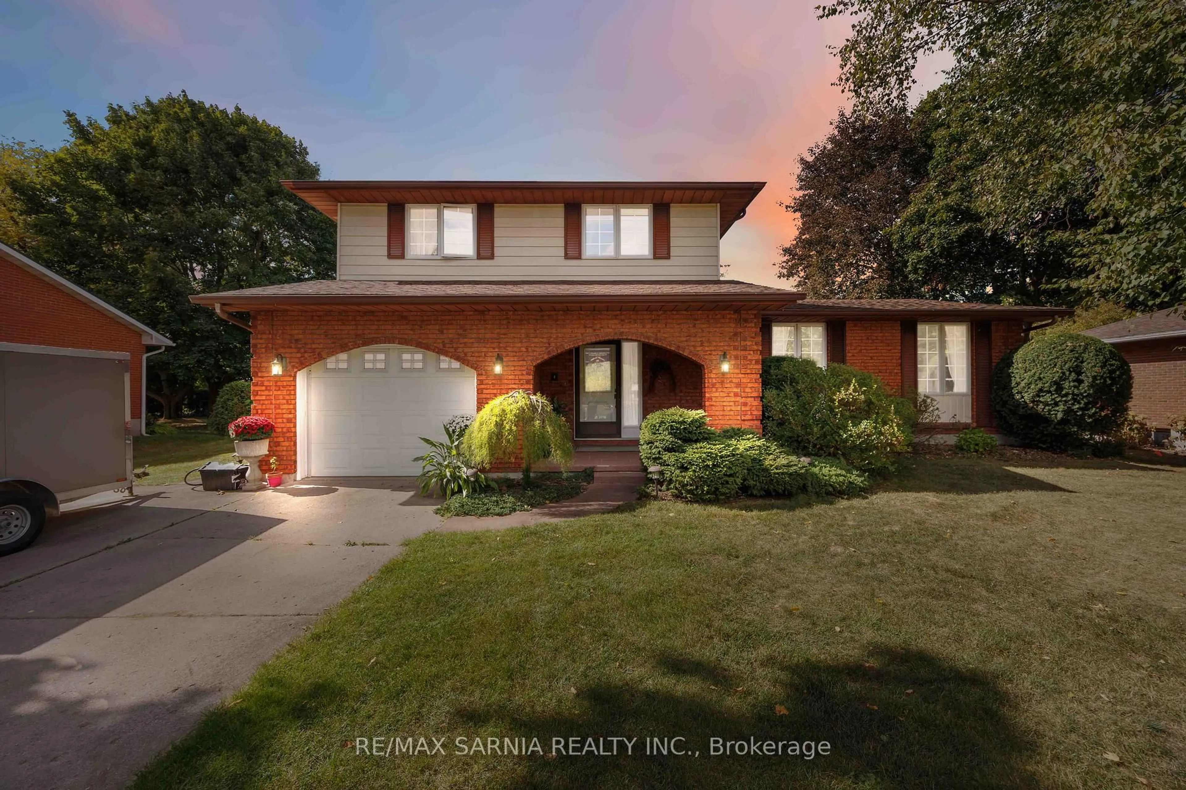 Home with brick exterior material, street for 26 Park Lane, Lambton Shores Ontario N0N 1J0