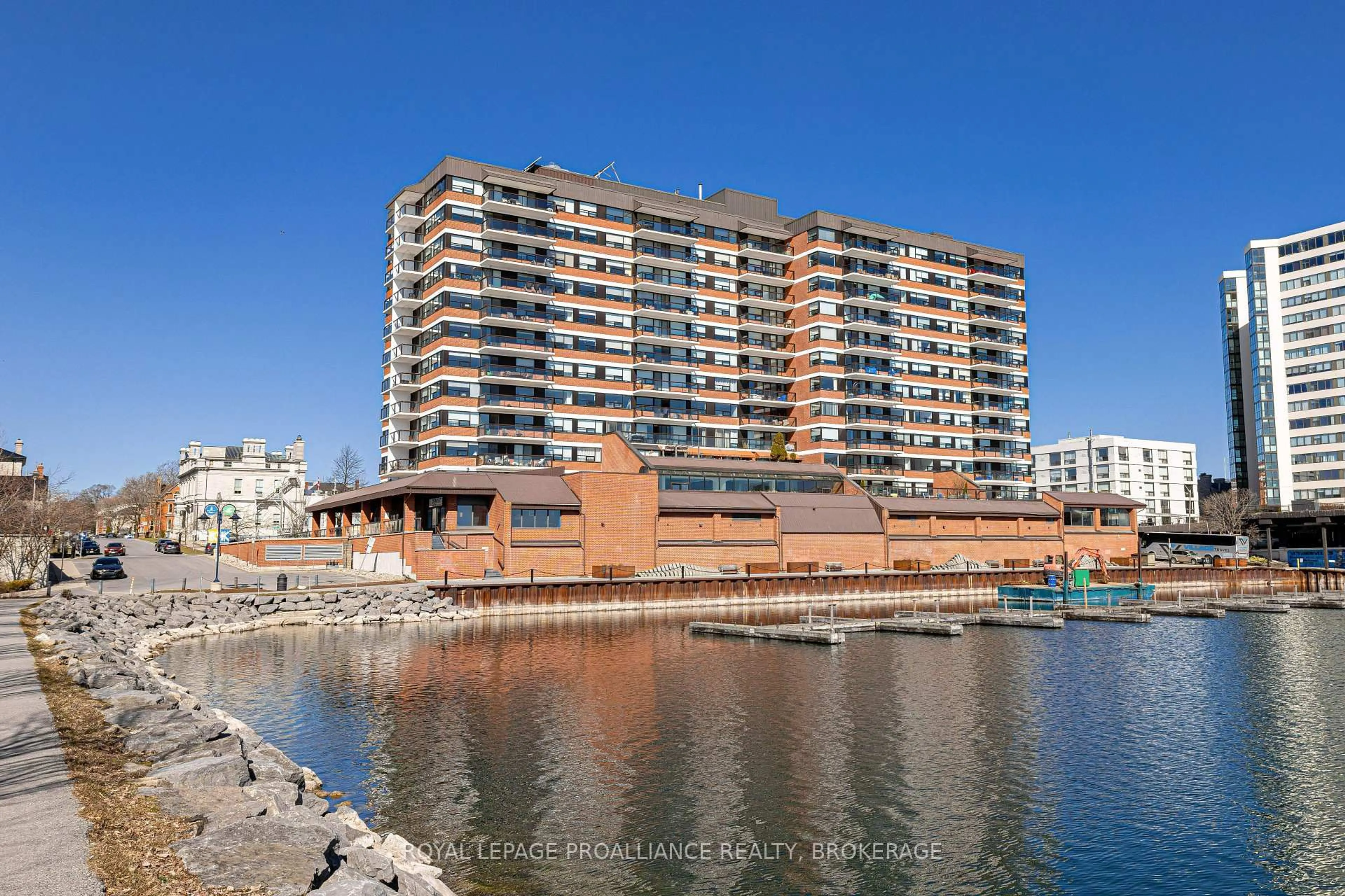 A pic from outside/outdoor area/front of a property/back of a property/a pic from drone, water/lake/river/ocean view for 165 Ontario St #301, Kingston Ontario K7L 2Y6